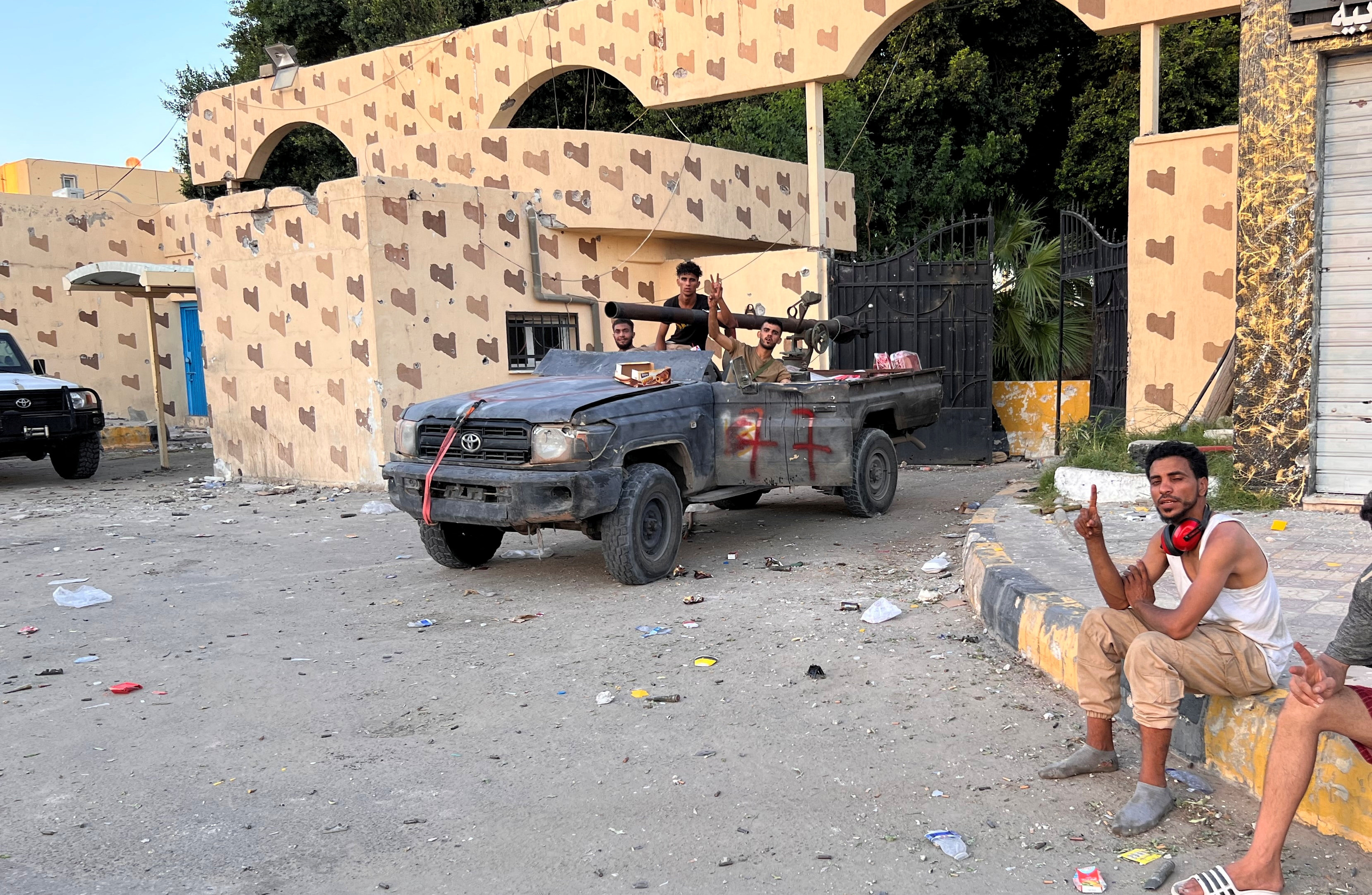 Fighters loyal to the head of Libya’s Government of National Unity (GNU) and Prime Minister Abdulhamid al-Dbeibah, gather in the streets amid clashes in Tripoli