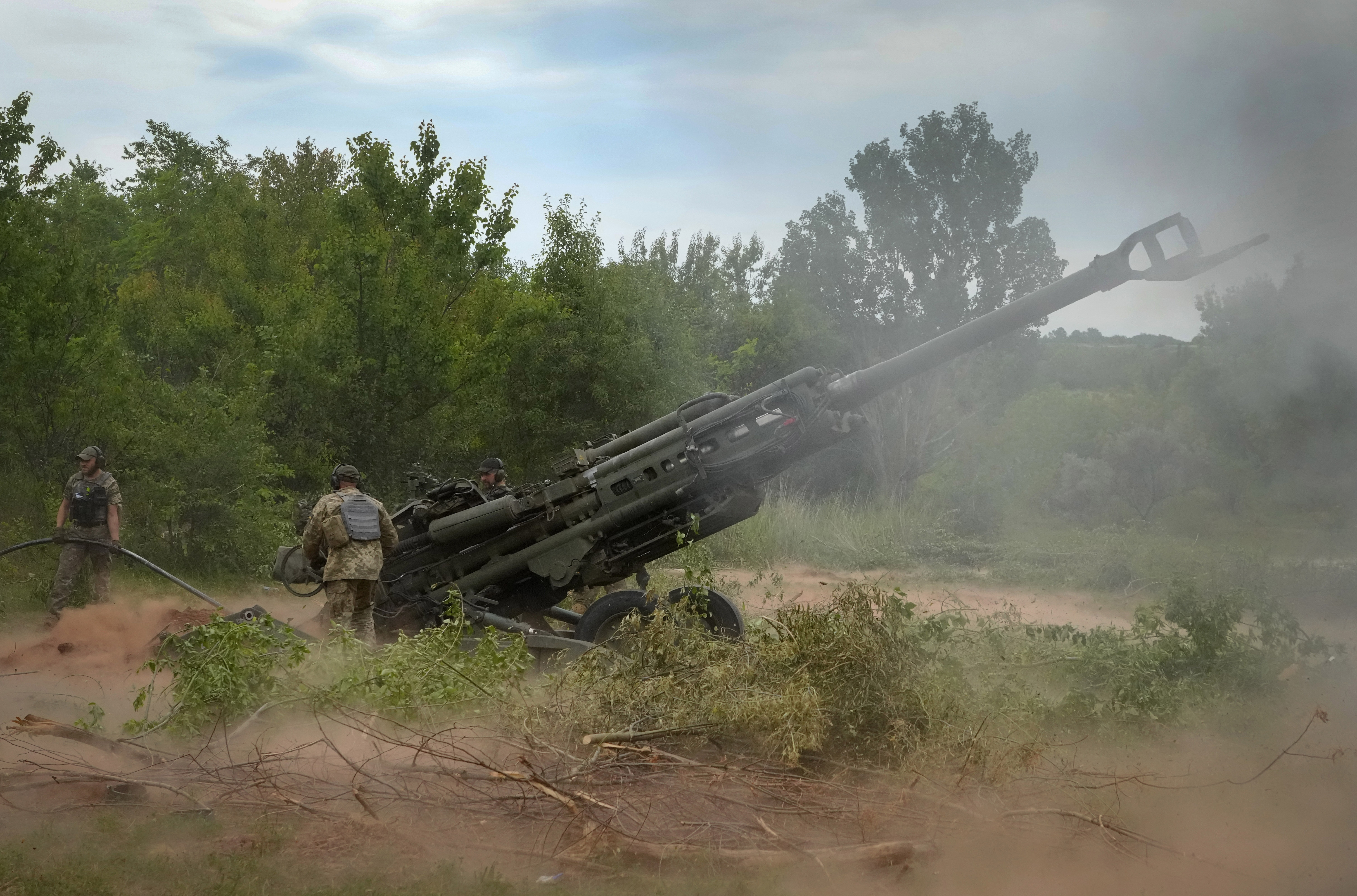 Ukrainian soldiers first from a US-supplied howitzer