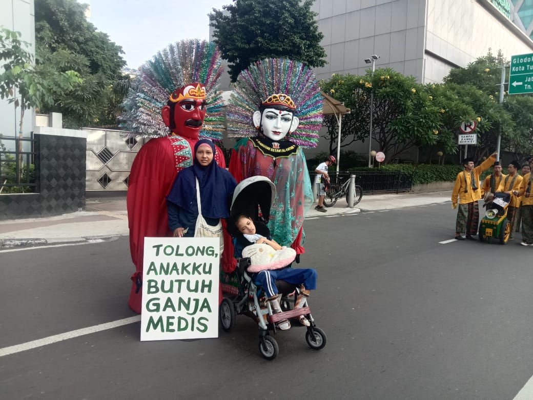 Warastuti campaigns for the legalisation of medical marijuana on the streets of Jakarta, Indonesia.