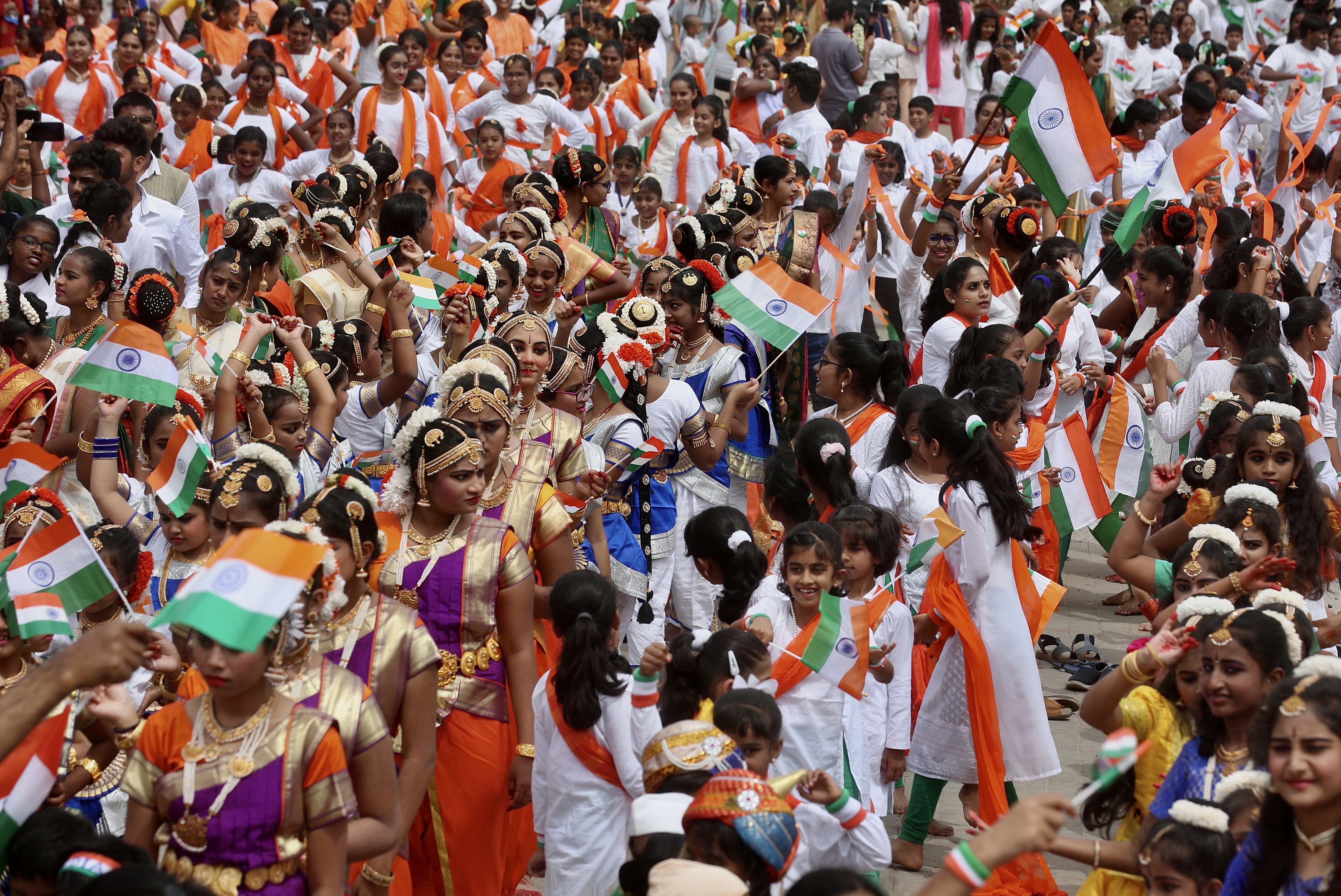 School children colourfully attired as they take part in the cultural event on the eve of 75th years of India's Independence