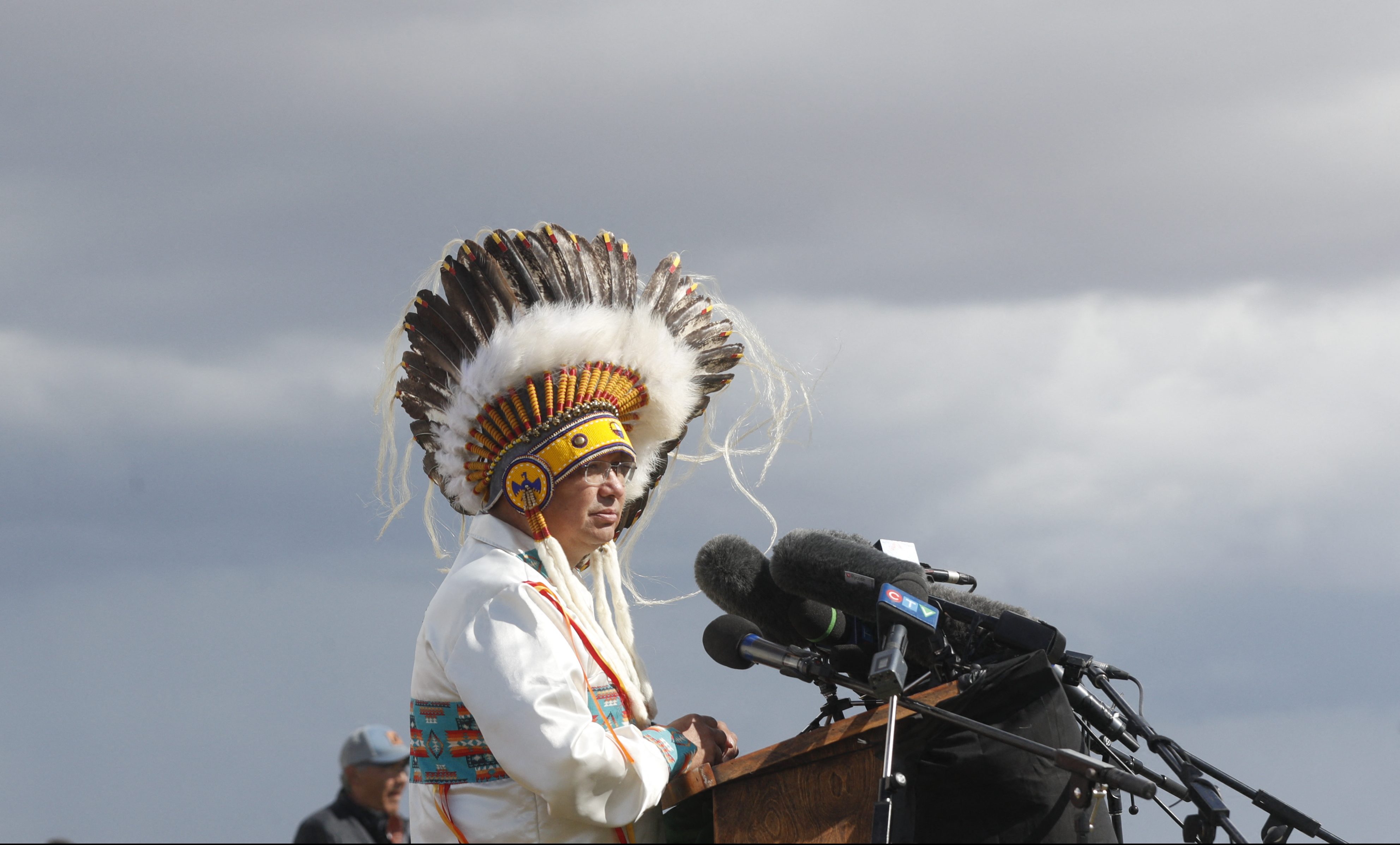 James Smith Cree Nation Chief Wally Burns speaks at a podium