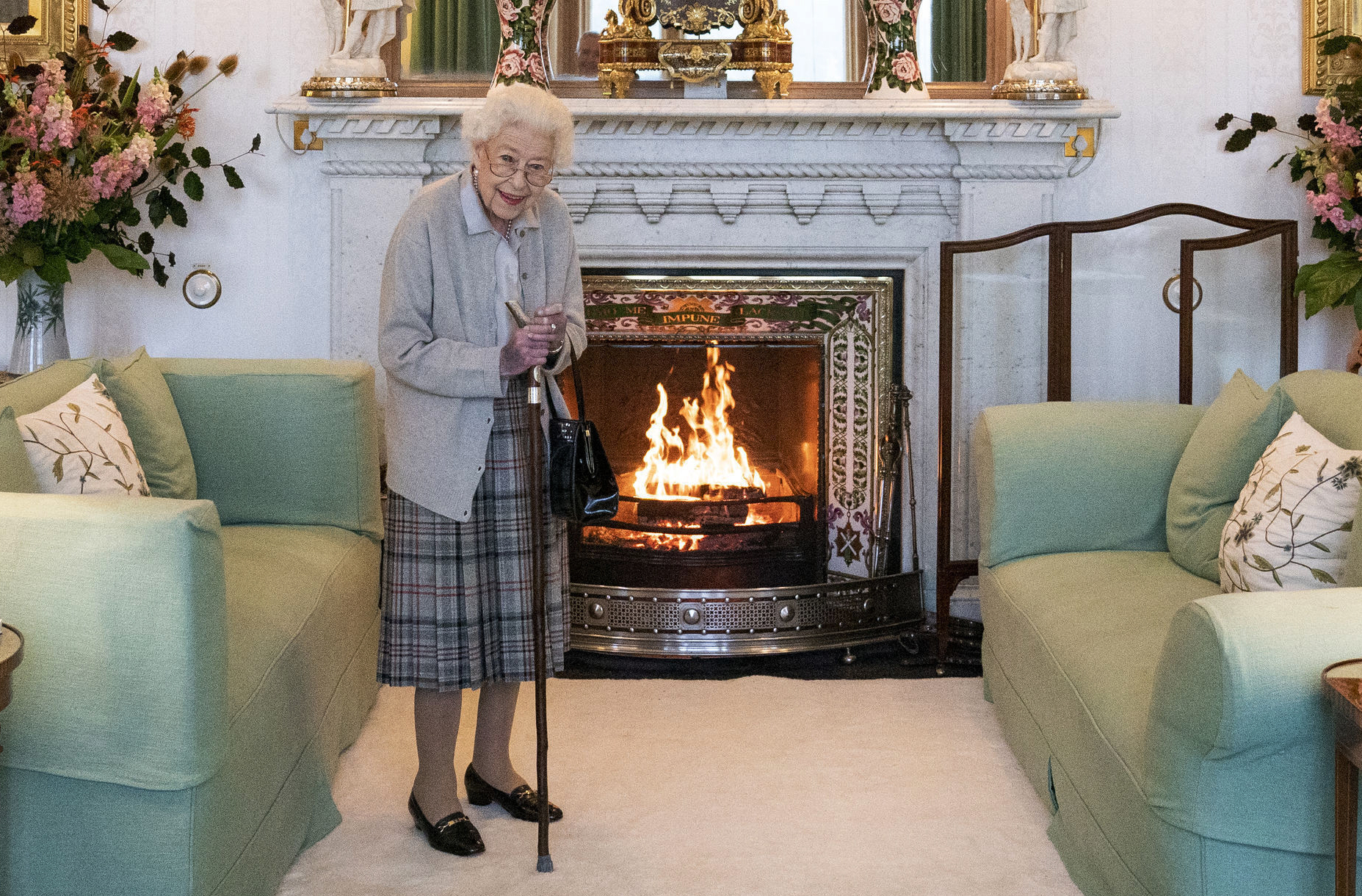 Britain's Queen Elizabeth II waits in the Drawing Room before receiving Liz Truss for an audience at Balmoral, in Scotland, Tuesday, Sept. 6, 2022