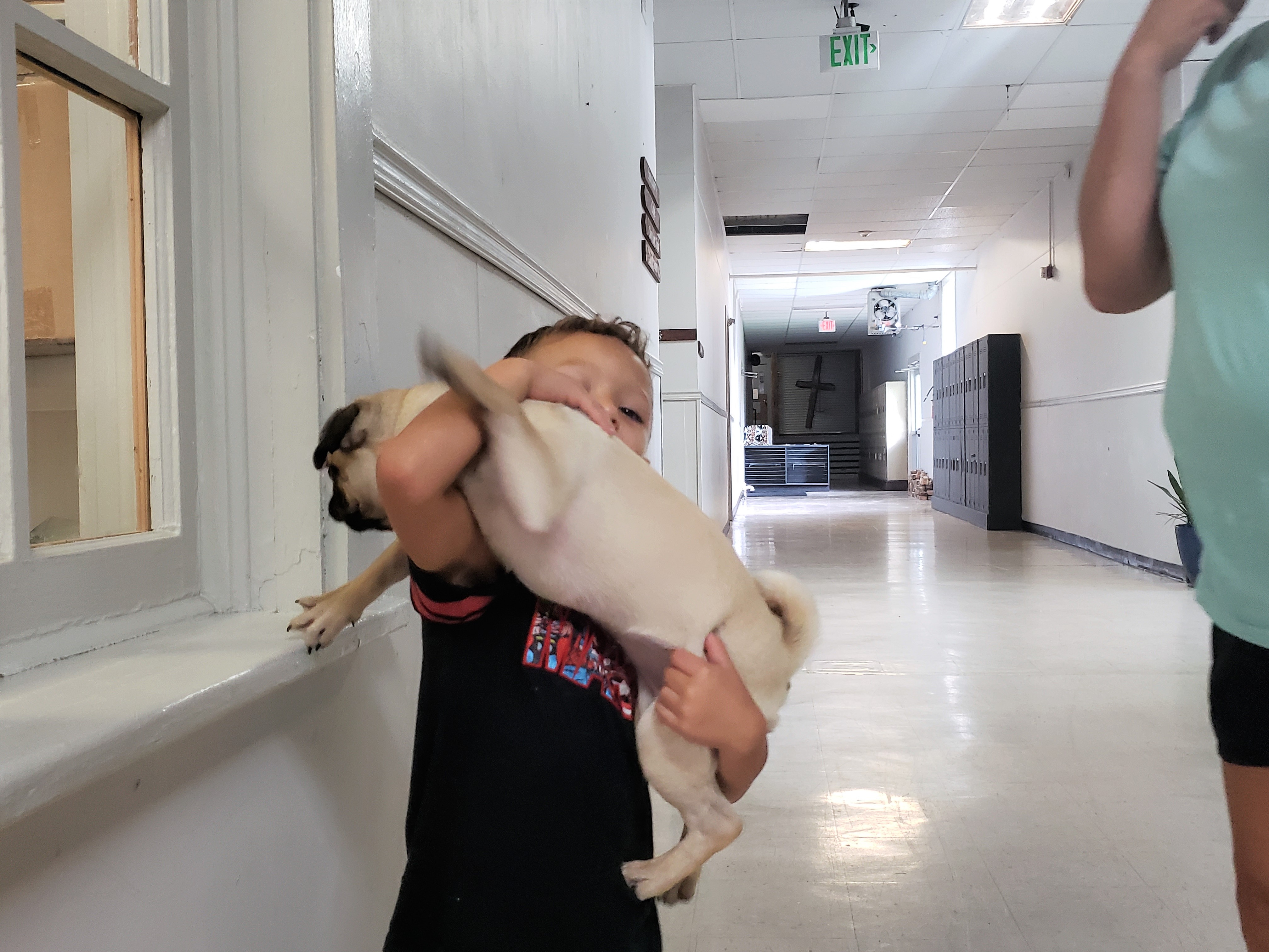 Josiah attempts to hold Gracie, whom Danielle describes as 'very wriggly'