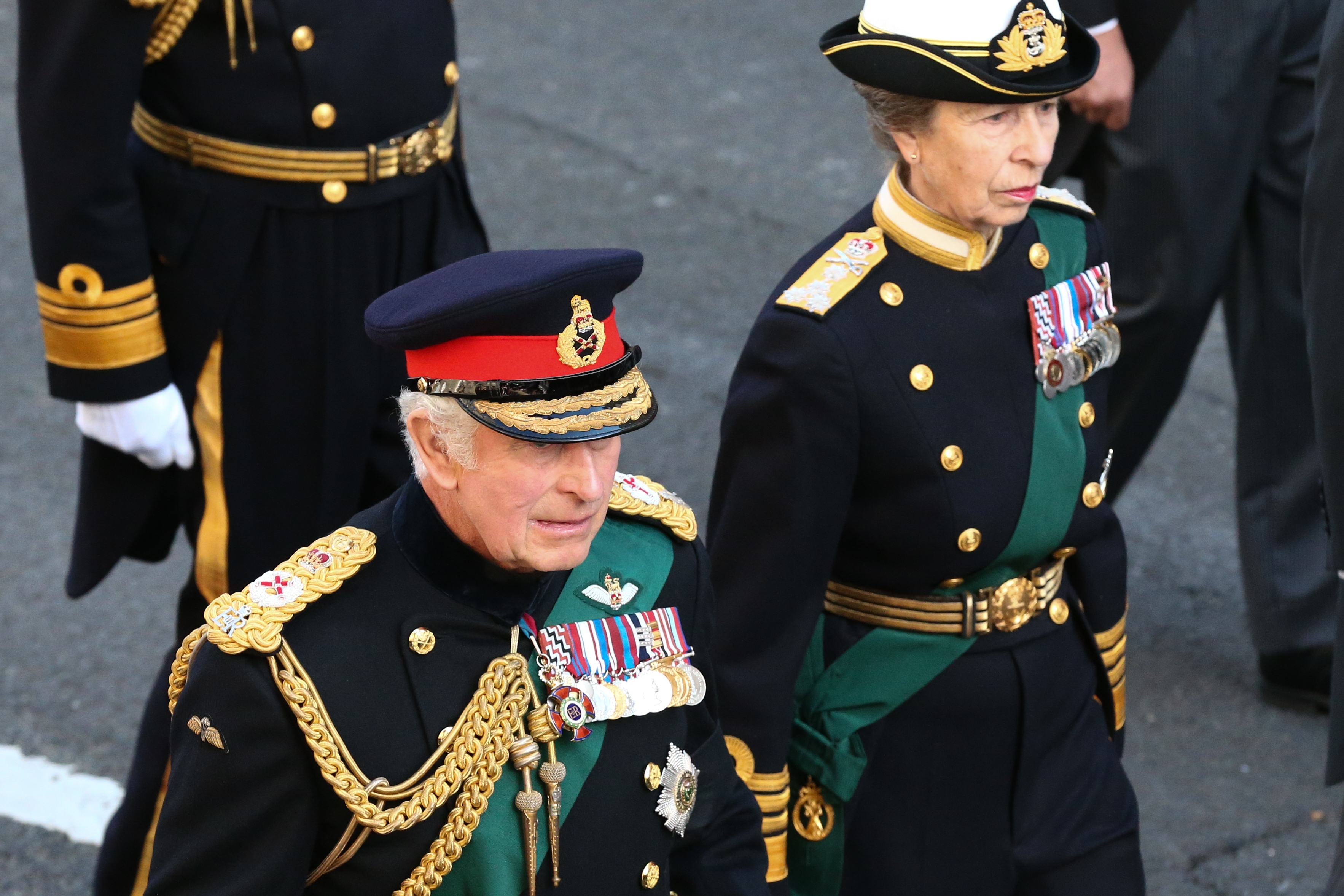 King Charles III and Princess Anne join the procession of the coffin of their mother from the Palace of Holyroodhouse to St Giles Cathedral
