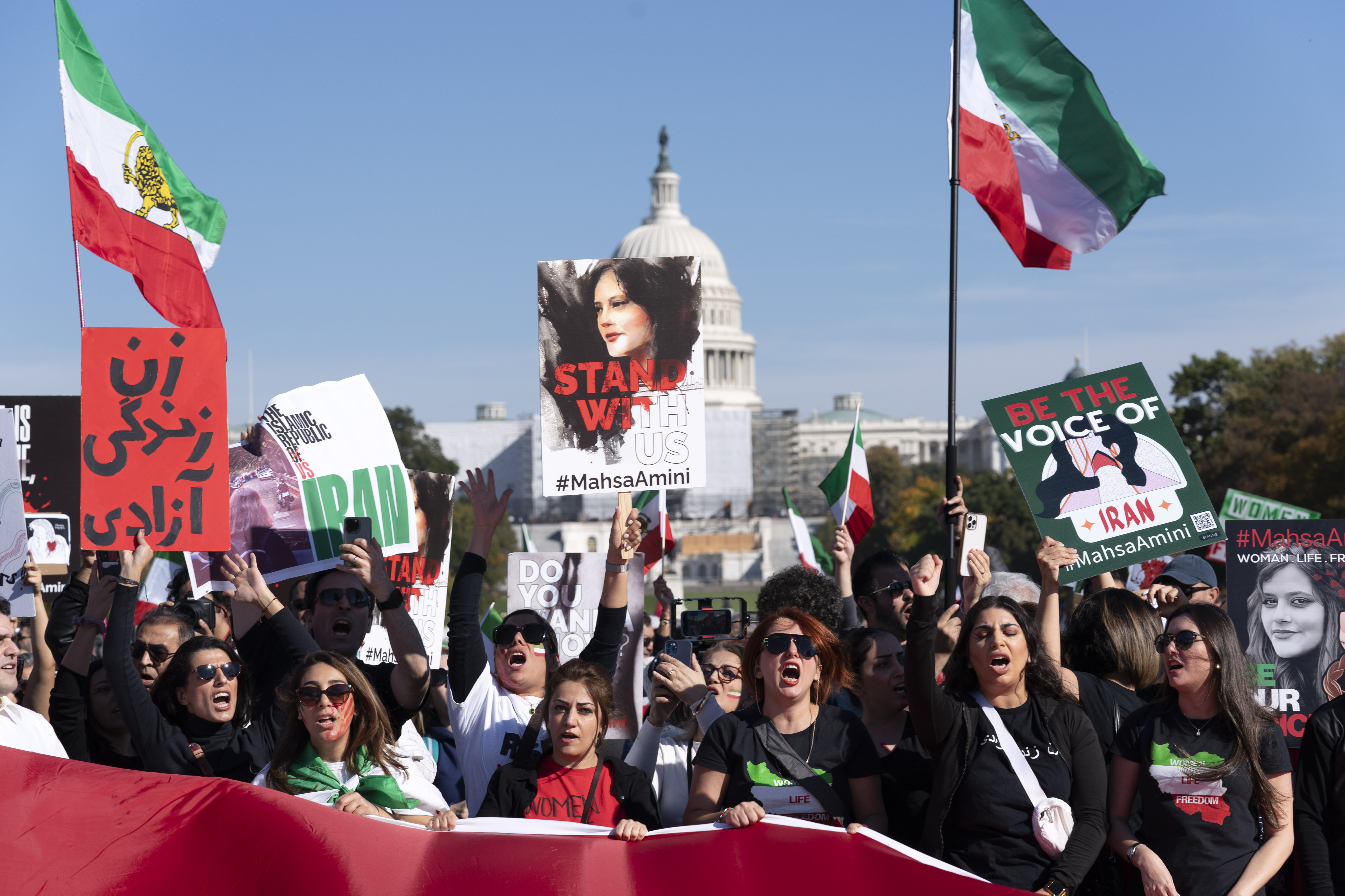 Demonstrators rally at the National Mall to protest against the Iranian regime, in Washington.