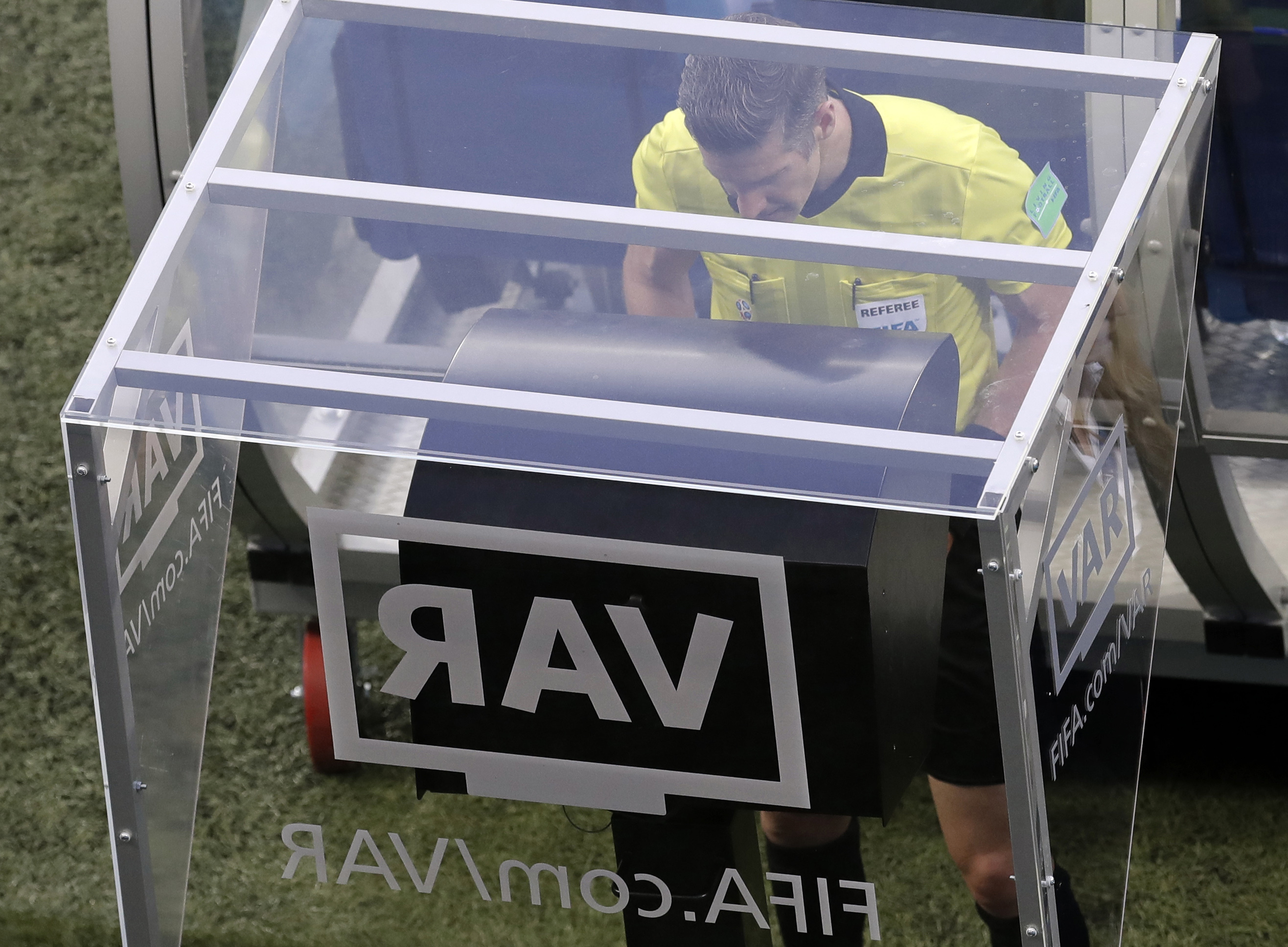 In this Friday, June 22, 2018 file photo, referee Matt Conger from New Zealand watches the Video Assistant Referee system, known as VAR during the group D match between Nigeria and Iceland at the 2018 World Cup in the Volgograd Arena in Volgograd, Russia.