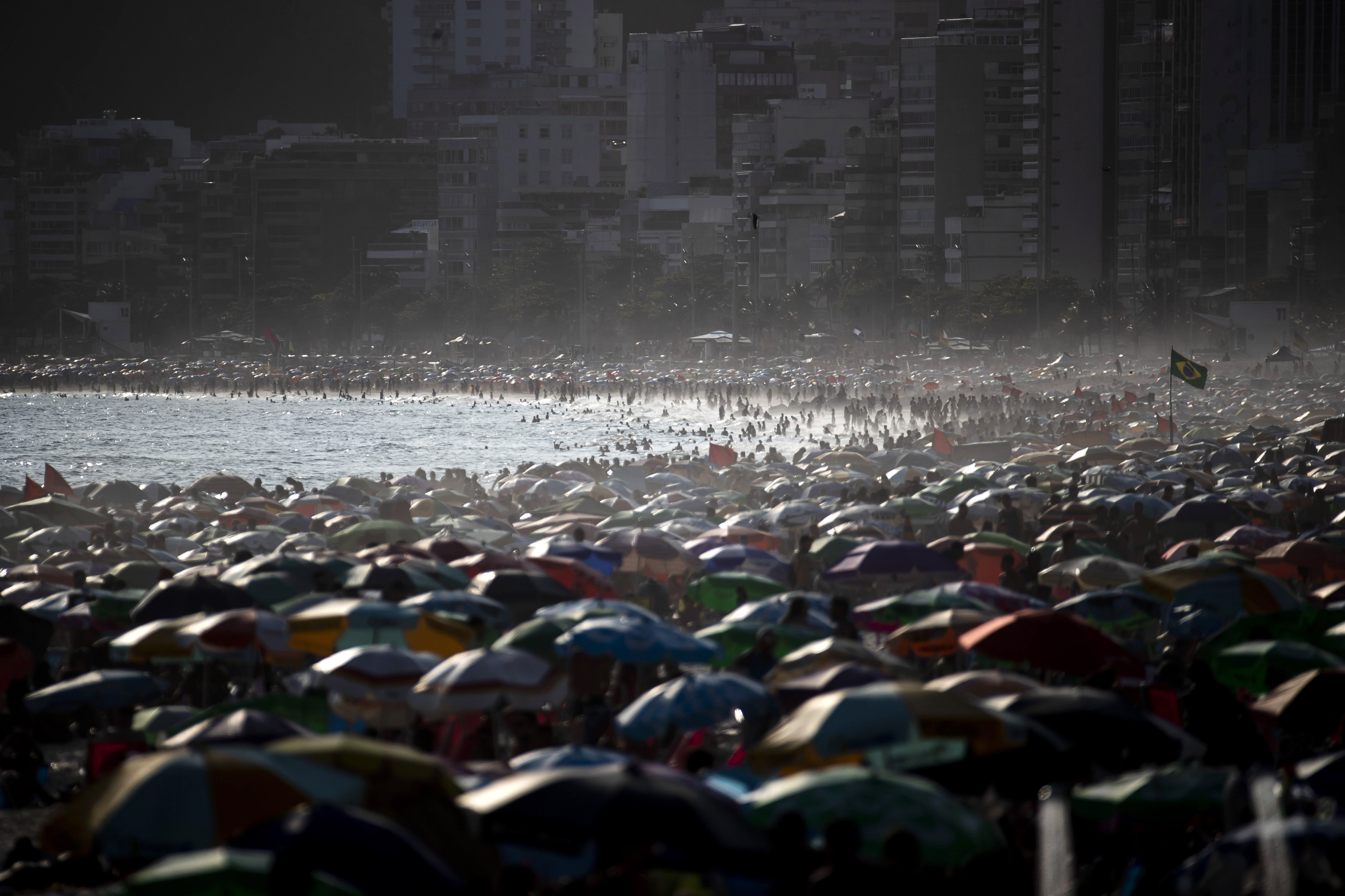 People enjoy the Ipanema beach, in Rio de Janeiro, Brazil