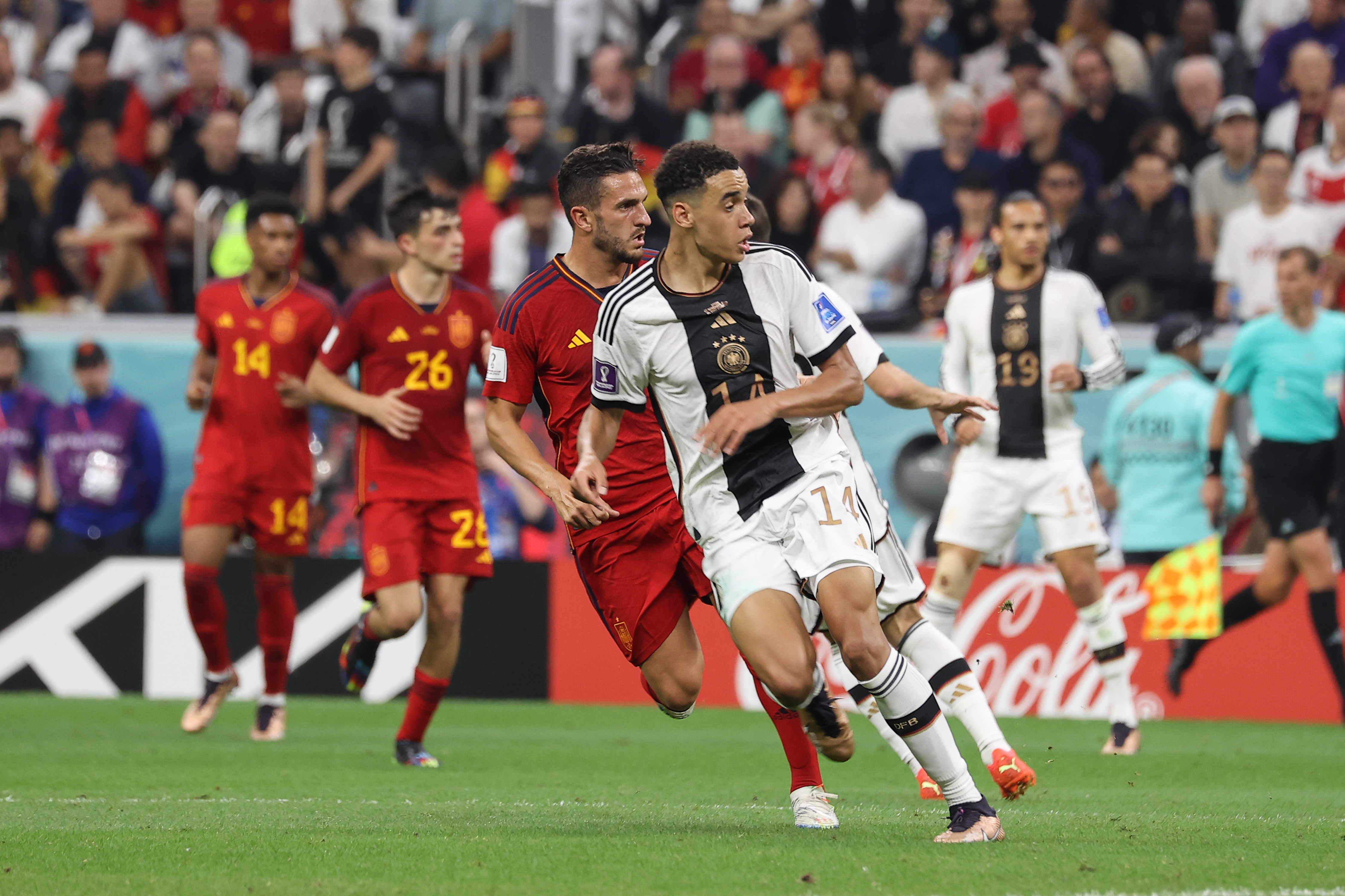 Players from Spain and Germany on the pitch during their Group E match at the FIFA World Cup 2022 at Al Bayt Stadium.