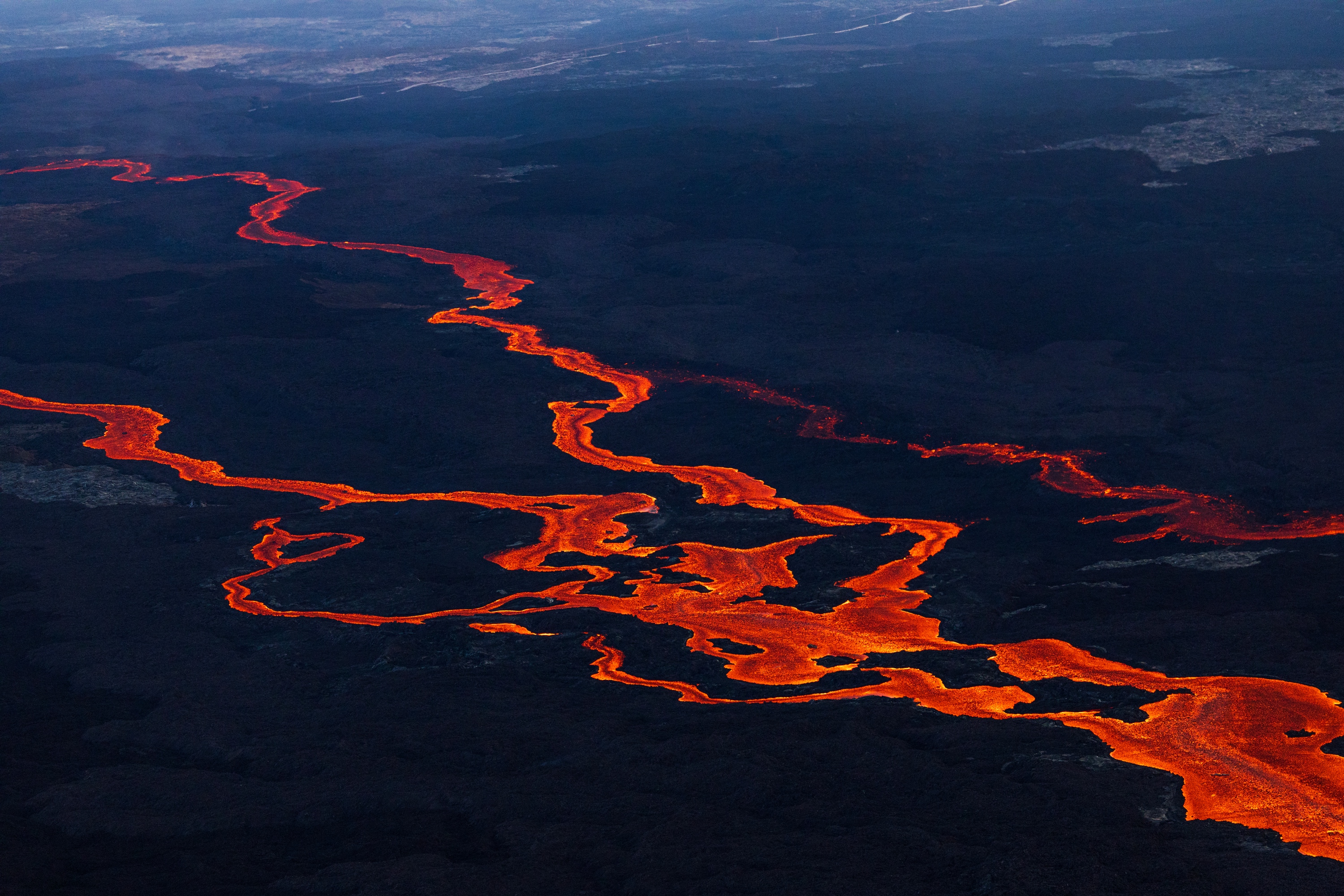 world's largest active volcano, Mauna Loa, continues to erupt from its northeast rift