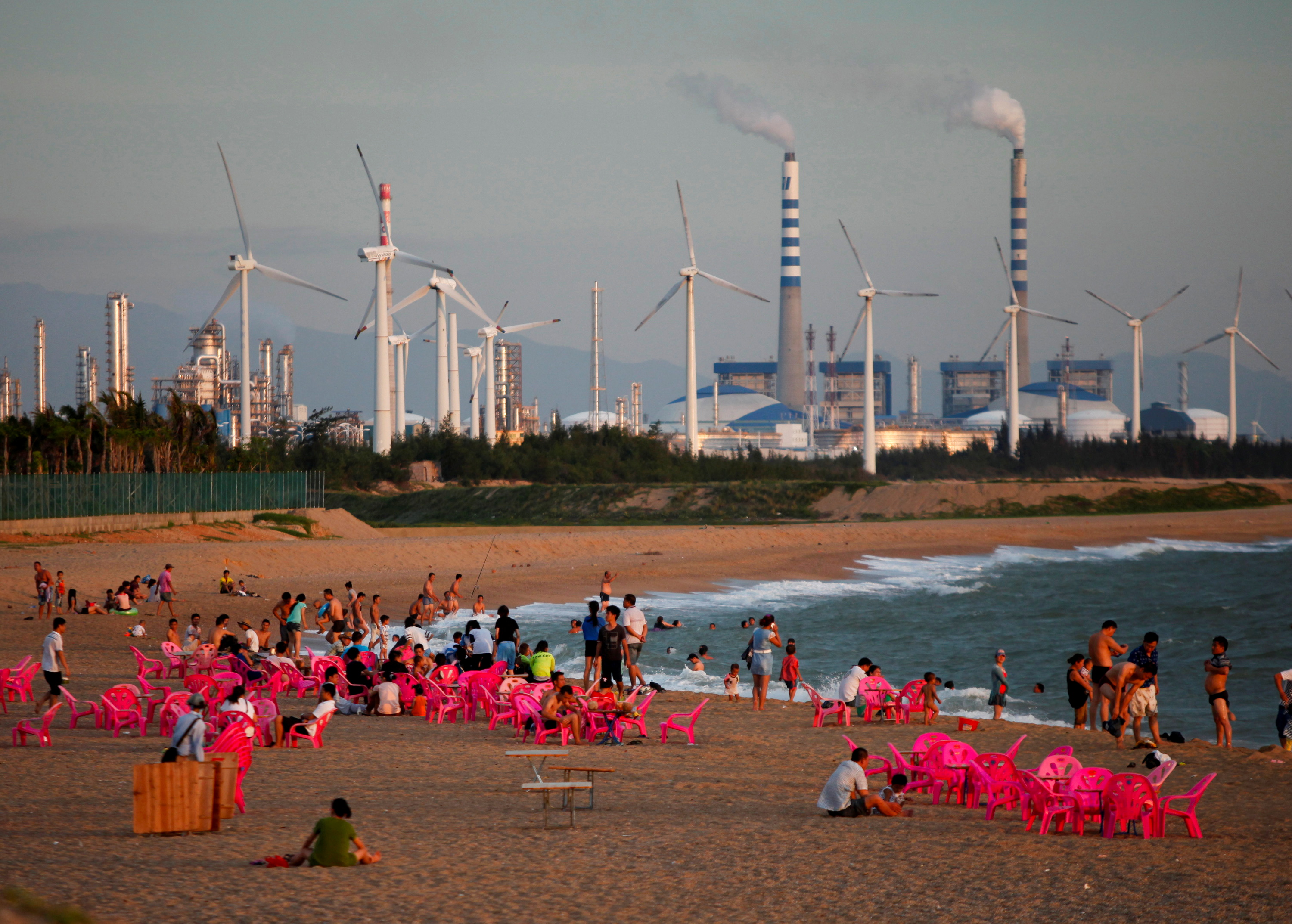 People enjoying the beach in Hainan, China.