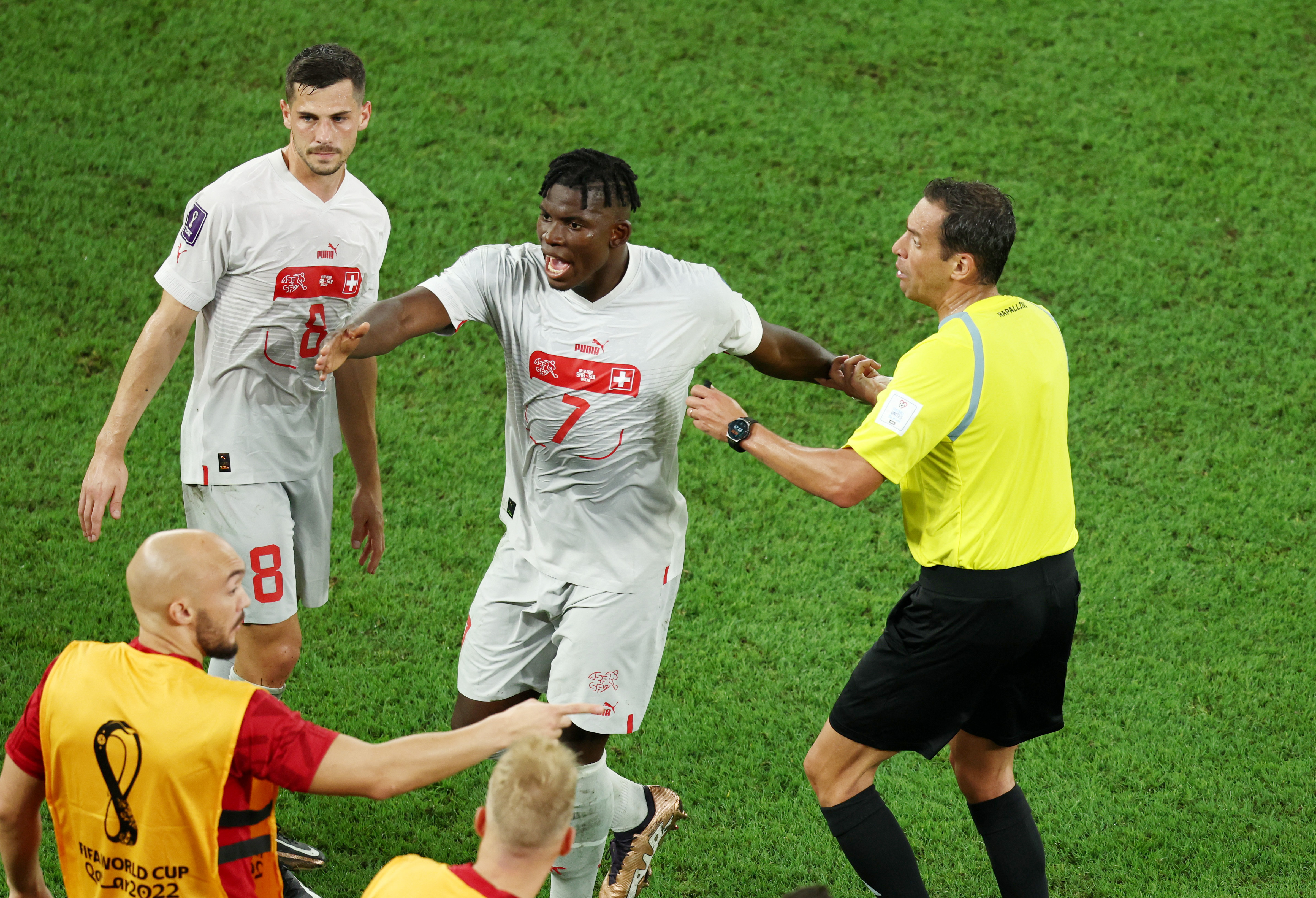 Referee Fernando Rapallini talks to Switzerland’s Breel Embolo during the Group G, Serbia vs Switzerland match at Stadium 974, Doha, Qatar on December 2, 2022