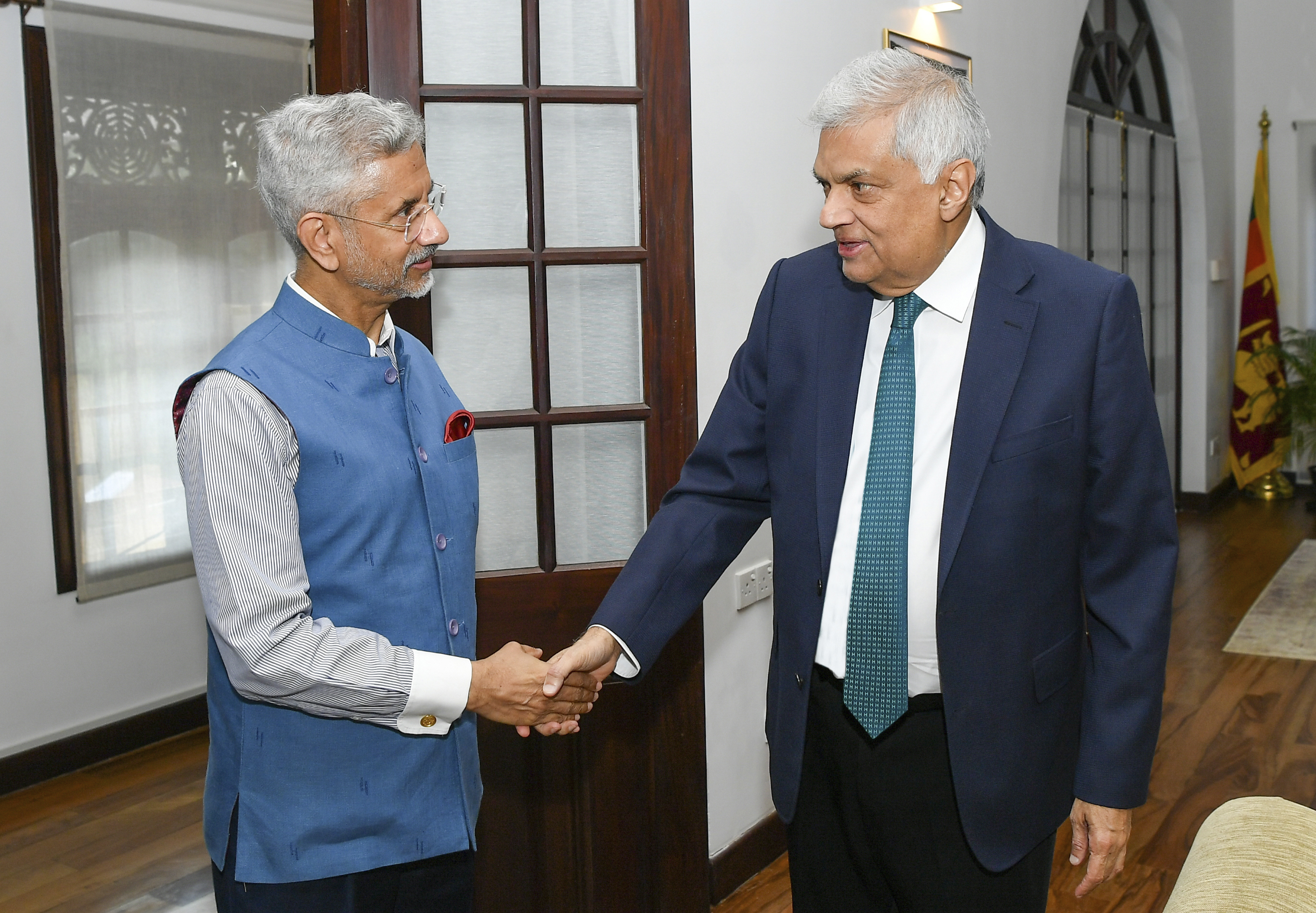 Indian Foreign Minister S Jaishankar shakes hands with Sri Lankan President Ranil Wickremesinghe.