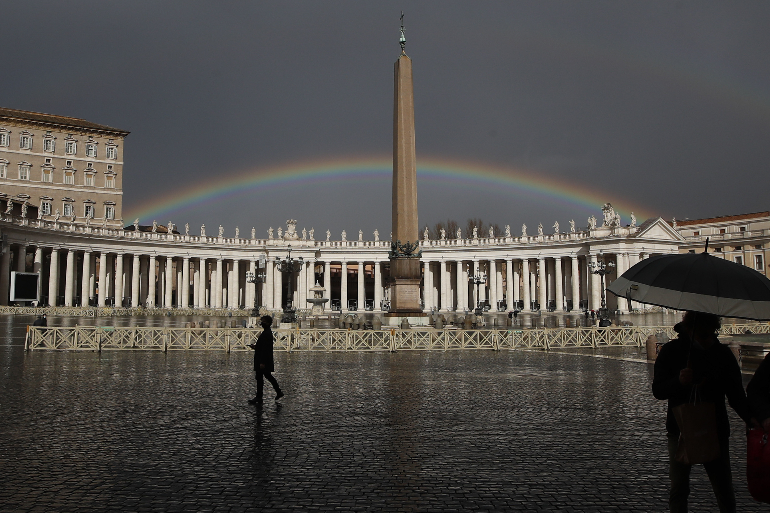 A rainbow shines over St.Peter's Square
