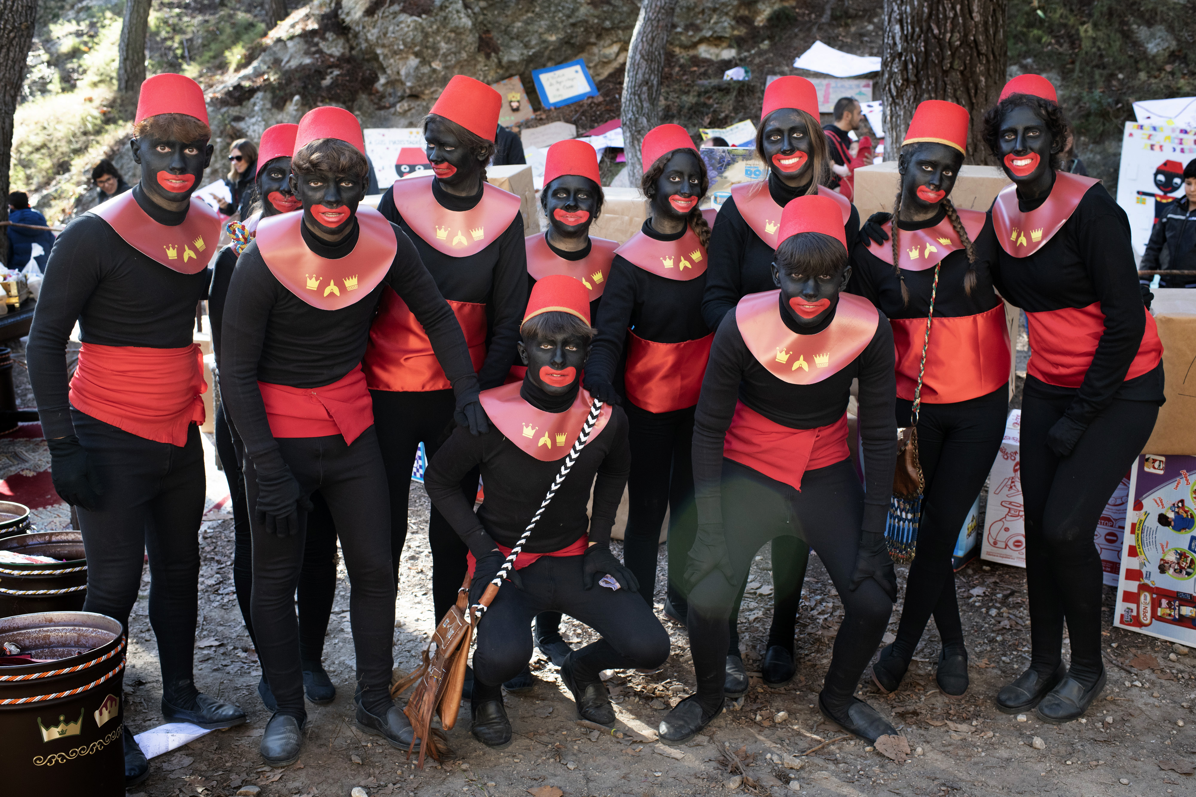 Blackface Pageboys and girls pose at the Magic Kings Camp