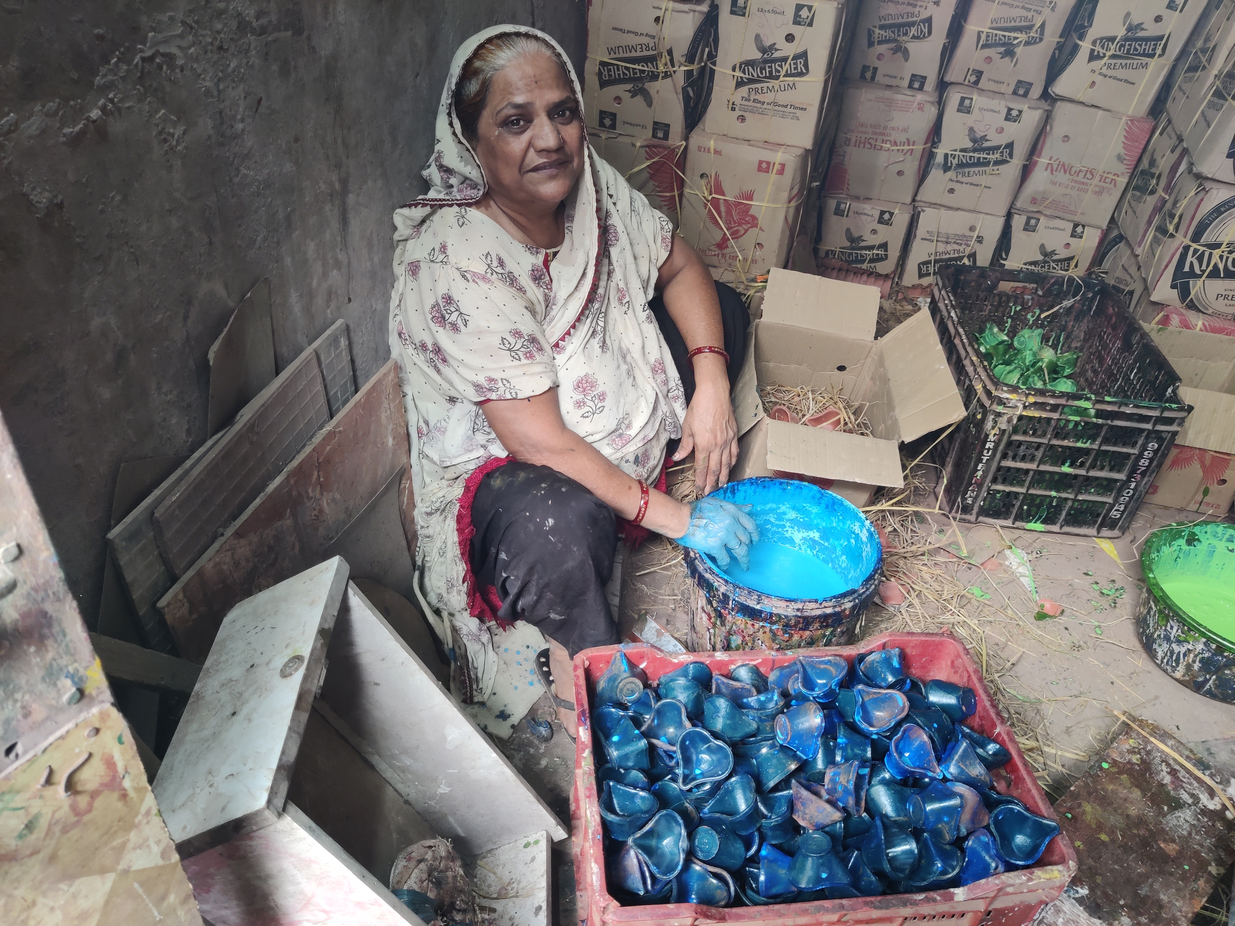 Sharifa Wagadiya makes traditional earthen lamps in Mumbai’s Dharavi shantytown
