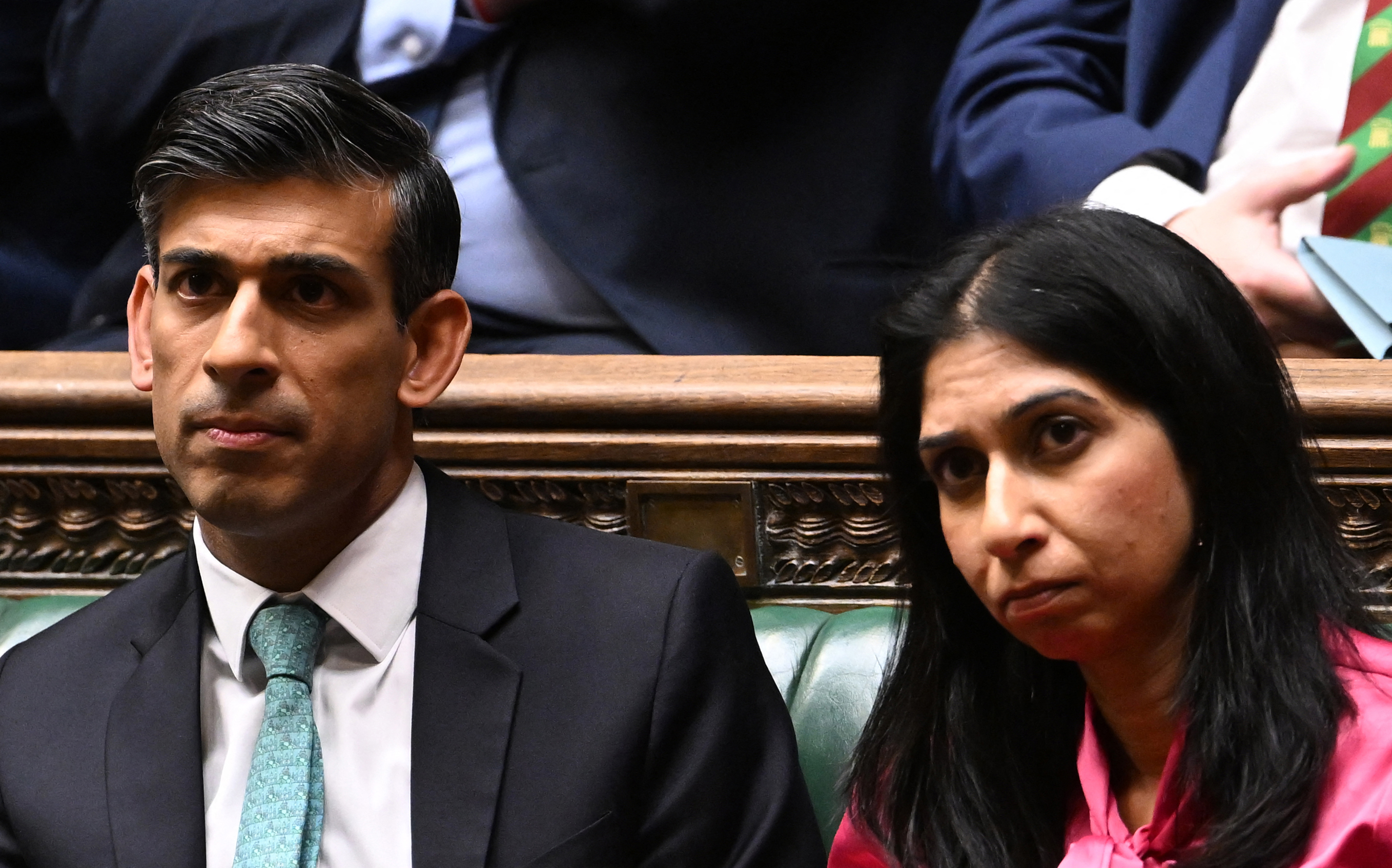 Sunak and his Home Secretary Braverman discussing immigration at the House of Commons