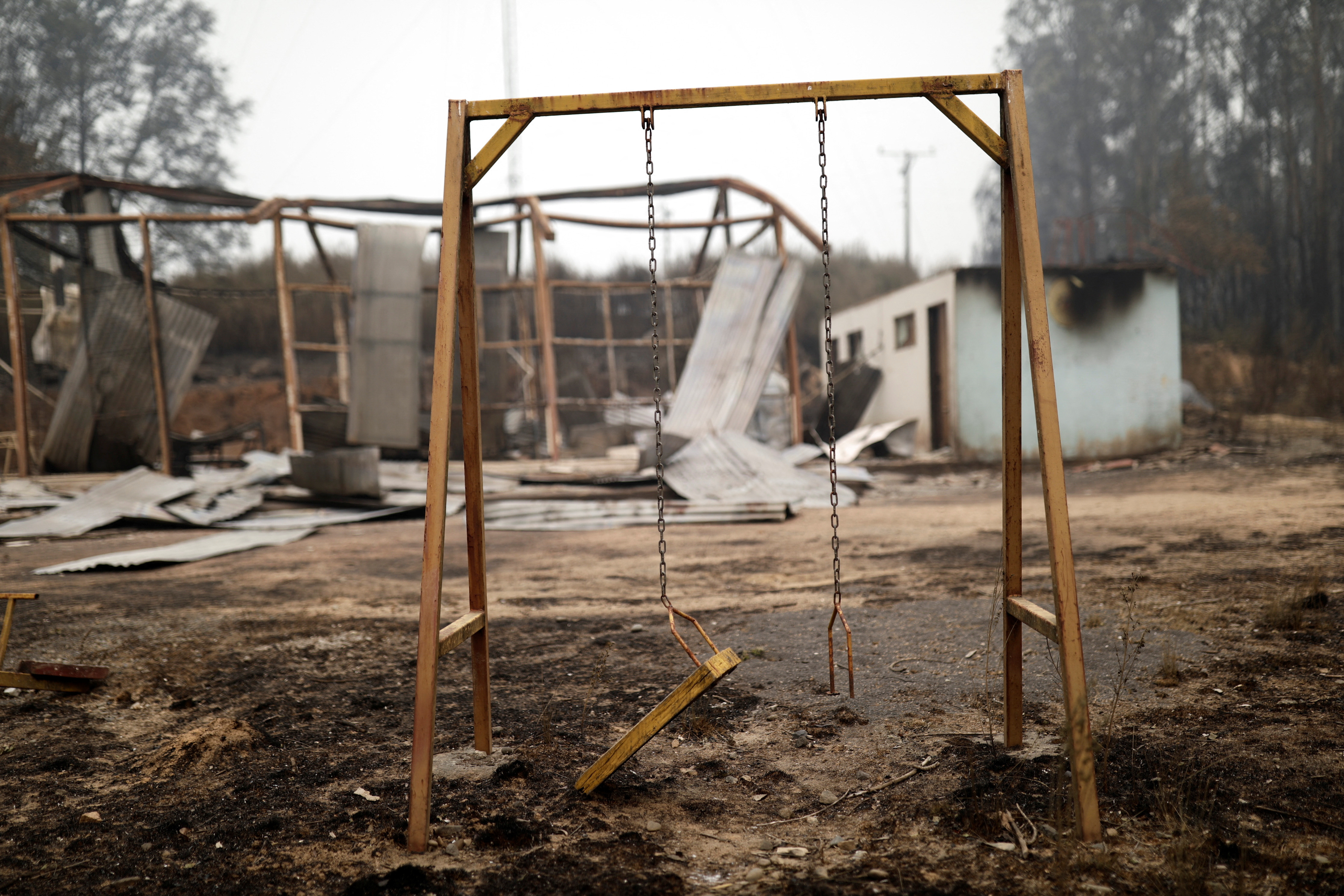 A swing is seen after a wildfire burned areas of Santa Juana, Chile on February 5, 2023