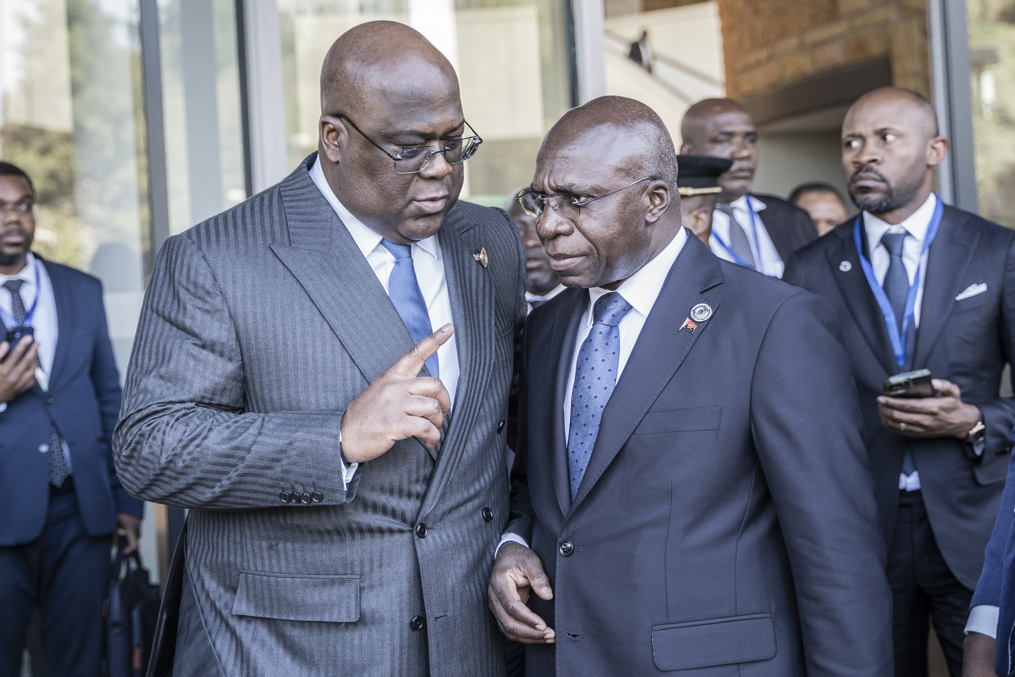 Democratic Republic of the Congo President Felix Tshisekedi (L) talks with Angola’s foreign minister Tete Antonio (R) on the sidelines of an African Union summit in Addis Ababa, on February 17, 2023