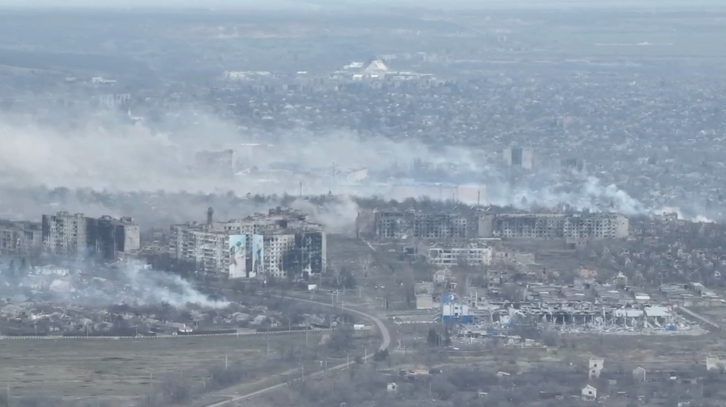 An aerial view shows smoke billowing, in Bakhmut, Ukraine, in still image taken from an undated video obtained from social media. @combat.art.ukraine via Instagram/via REUTERS THIS IMAGE HAS BEEN SUPPLIED BY A THIRD PARTY. MANDATORY CREDIT. NO RESALES. NO ARCHIVES.