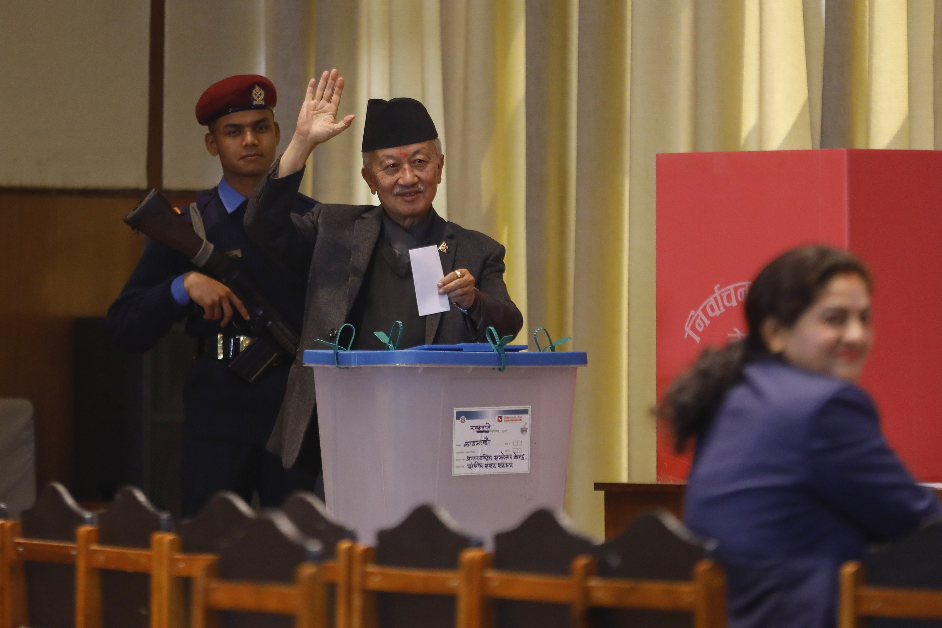 Nembang of the Communist Party of Nepal (Unified Marxist-Leninist) casts his vote
