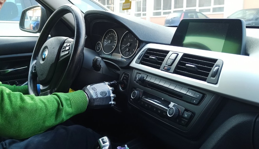Rasim drives an automatic car, which uses a button to start it