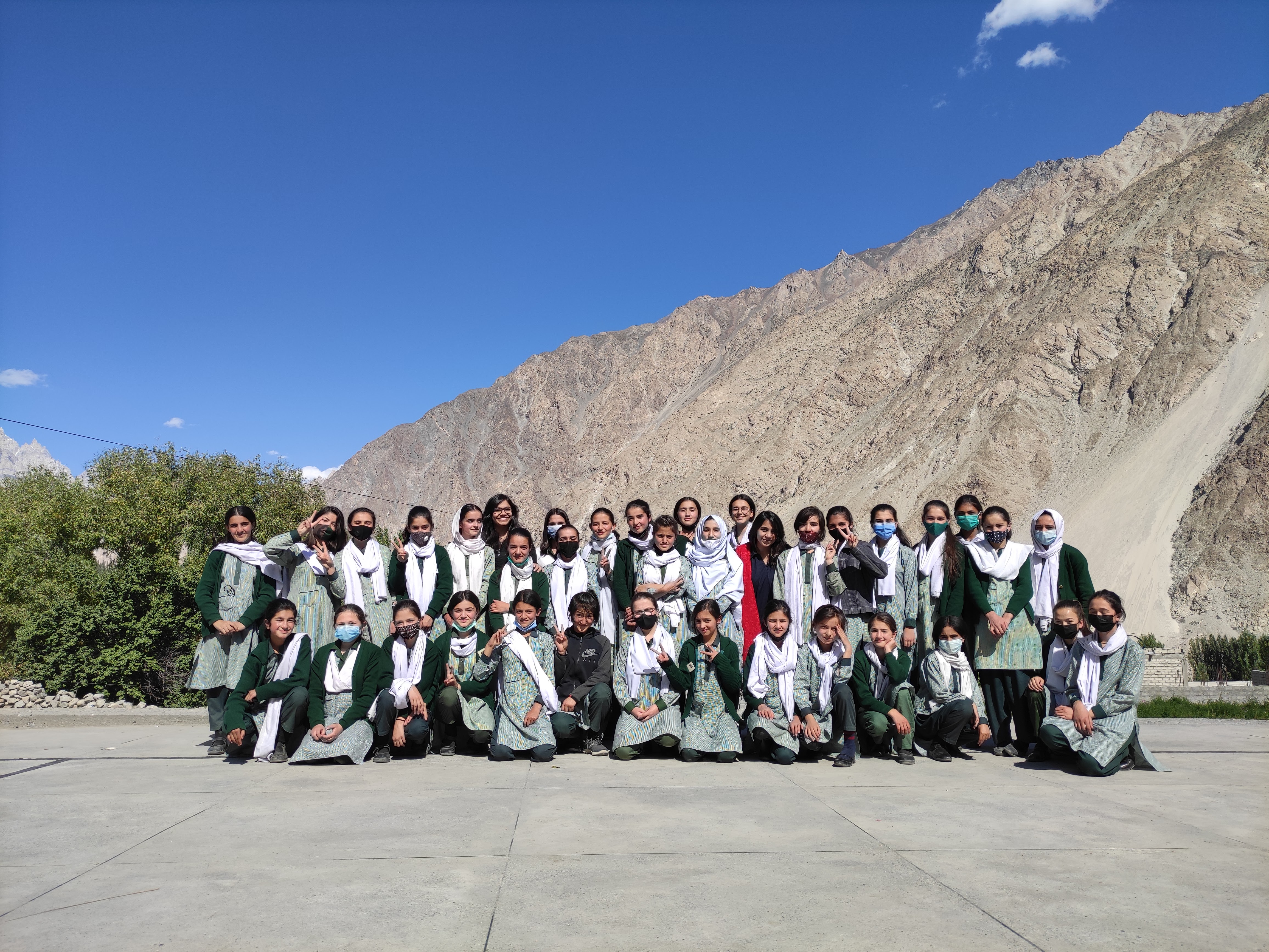 A group photo of students and teachers.
