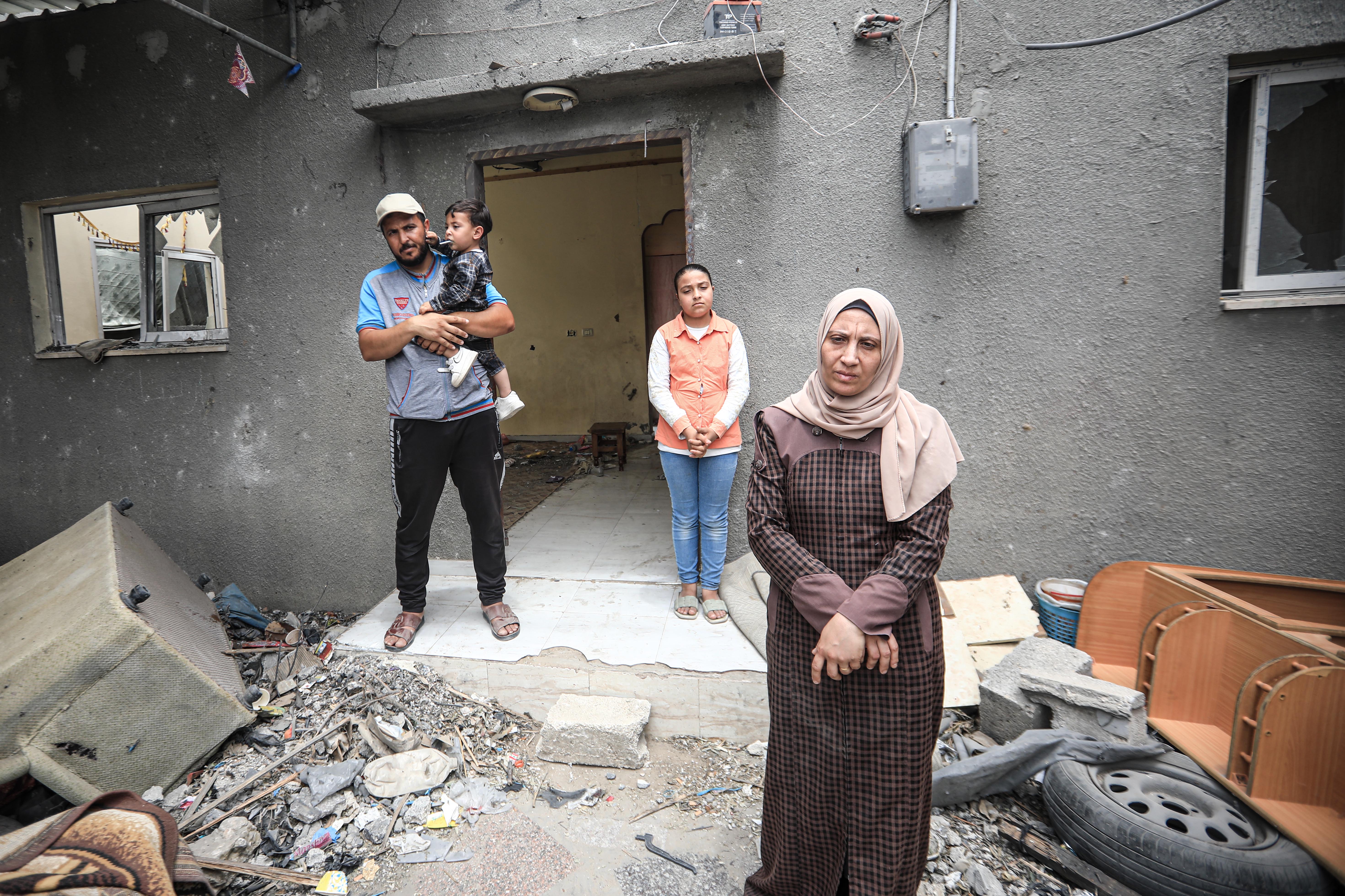 A sad woman in her home