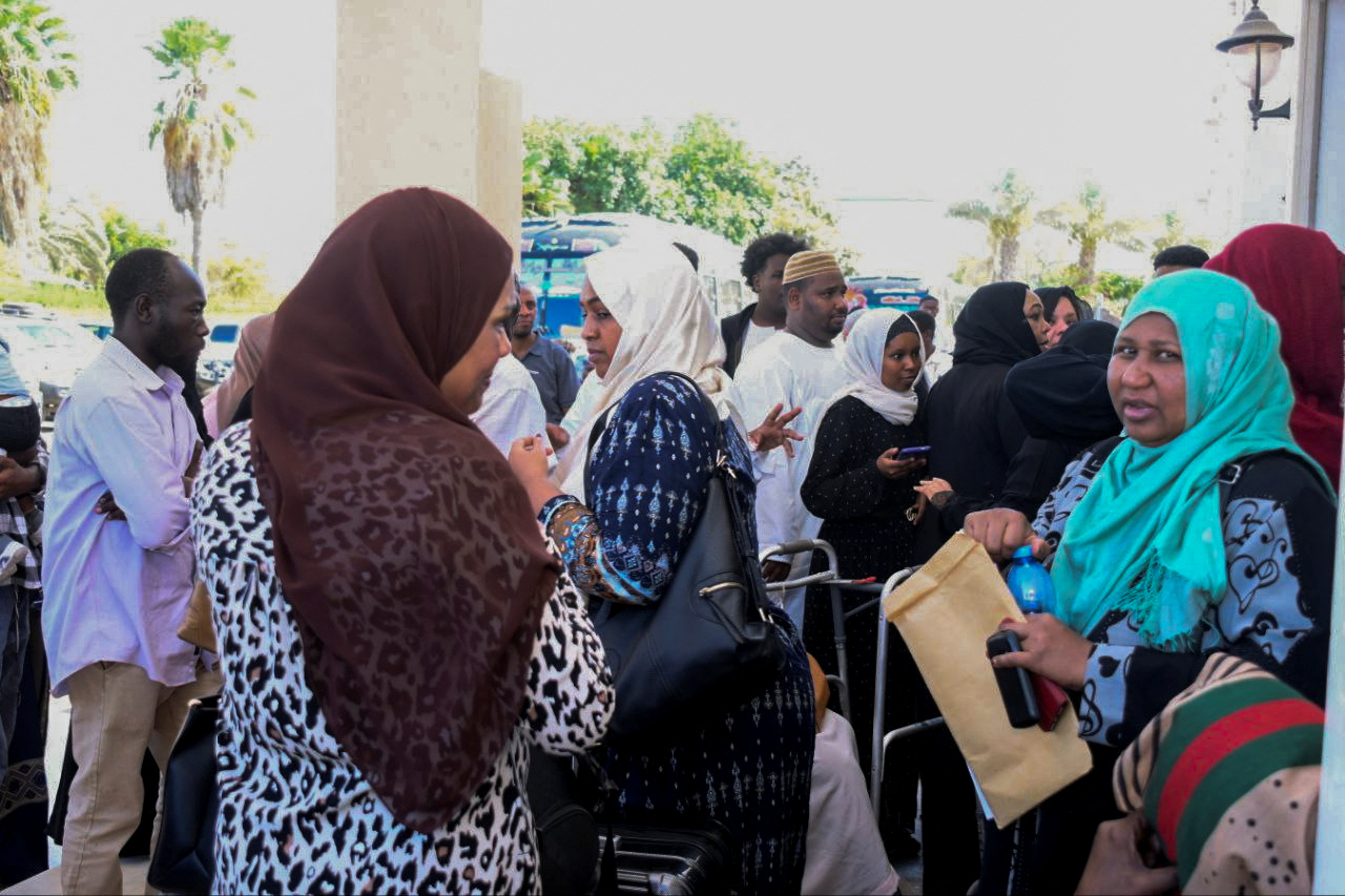 British nationals prepare for check regulations for evacuation at a hotel at the port, as clashes between the paramilitary Rapid Support Forces and the Sudanese army continue, in Port Sudan