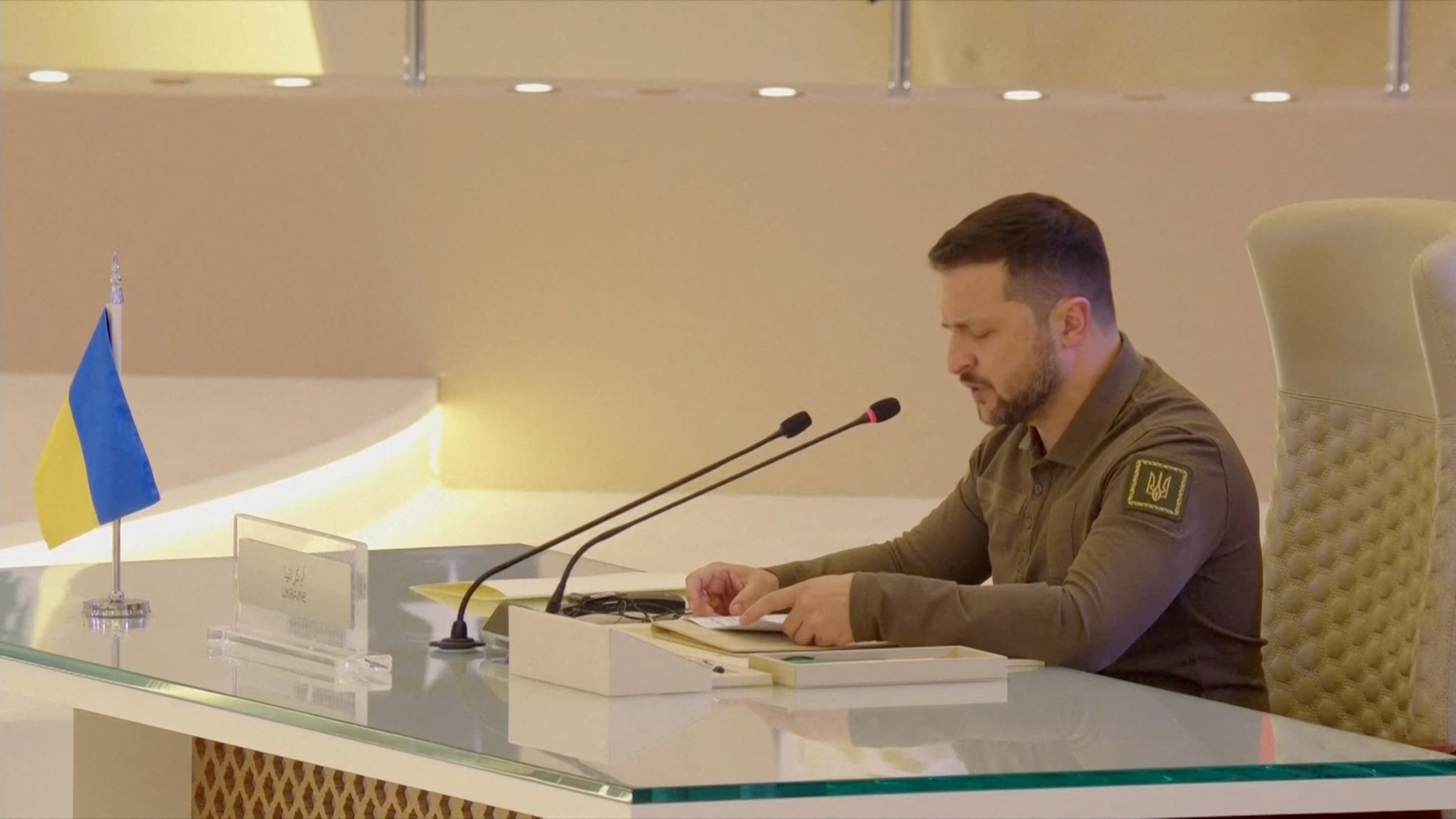 Ukrainian President Volodymyr Zelenskyy speaks as he attends the Arab League summit in Jeddah, Saudi Arabia