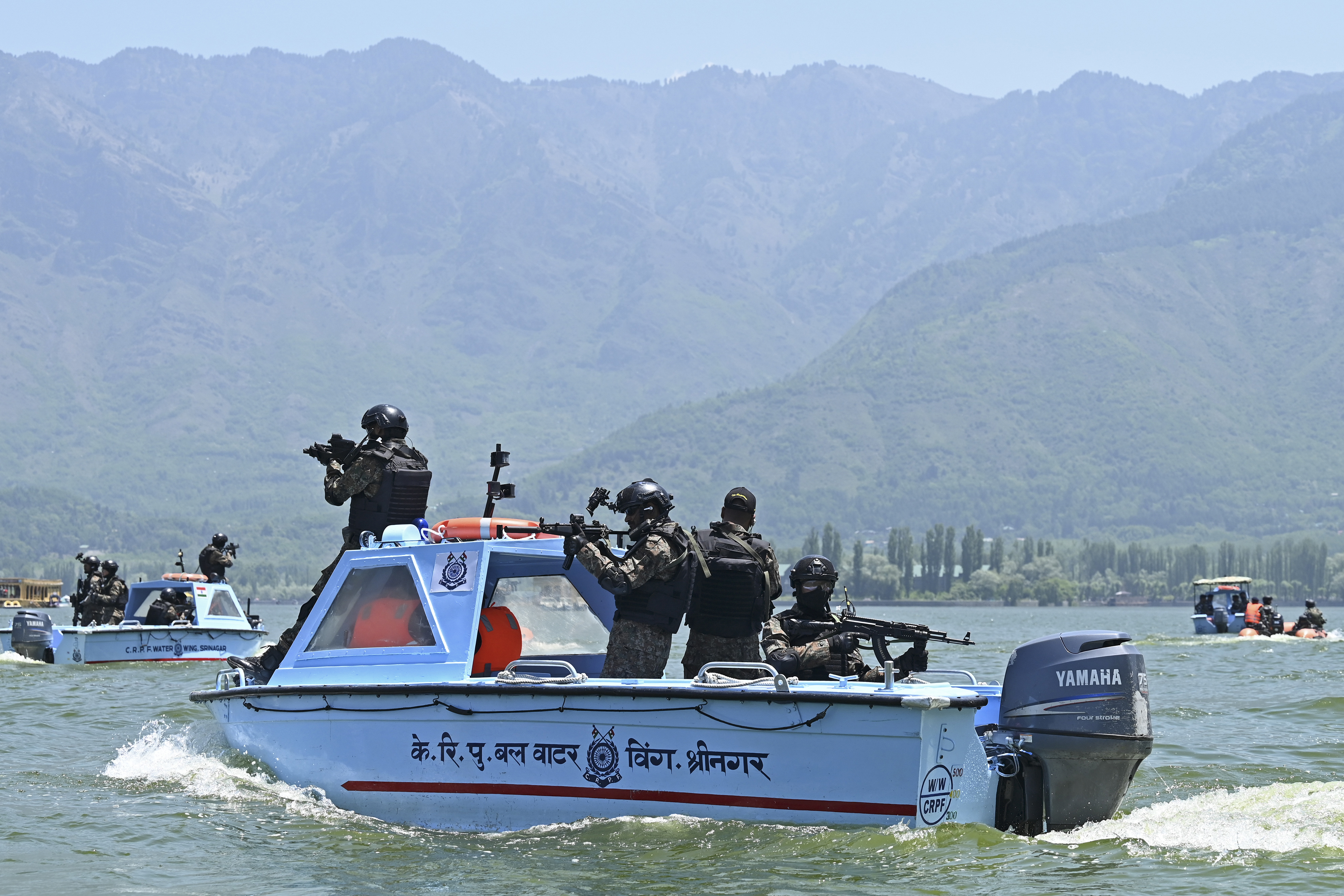 Indian soldiers conduct a special security drill at Dal Lake in Srinagar