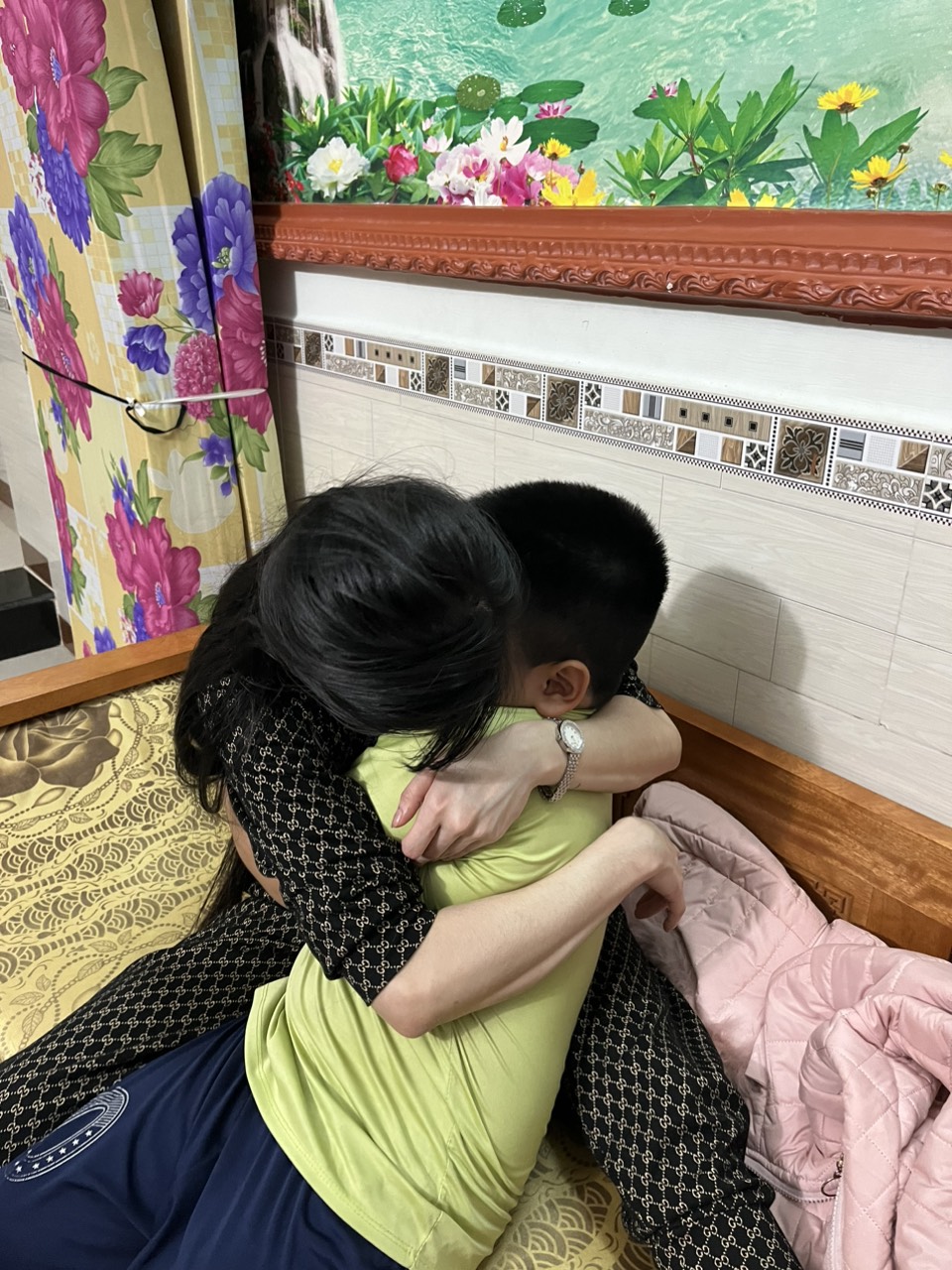 A Vietnamese woman rescued from Myanmar is reunited with her seven-year-old son [Courtesy of Blue Dragon Foundation]