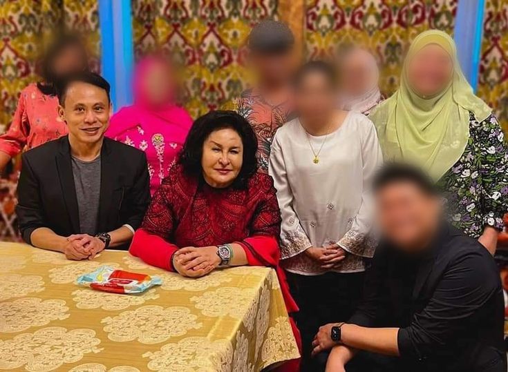 Clement Woo, aka Woo Kee Mun, with Rosmah Mansor [Facebook]