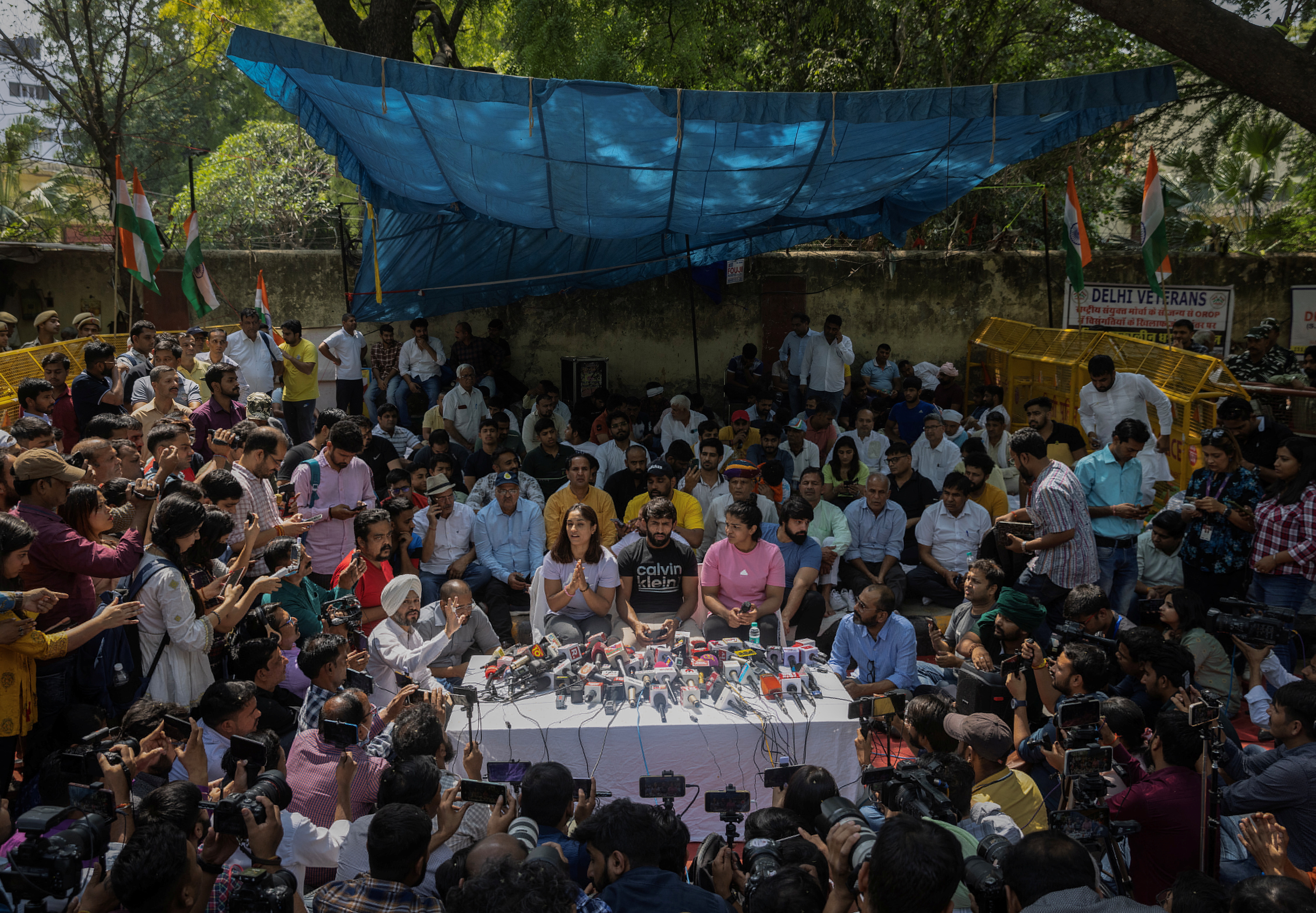 Indian wrestlers Vinesh Phogat, Bajrang Punia, and Sakshi Malik address a news conference as they take part in a sit-in protest demanding arrest of Wrestling Federation of India (WFI) chief, who they accuse of sexually harassing female players, in New Delhi, India, April 24, 2023. REUTERS/Adnan Abidi