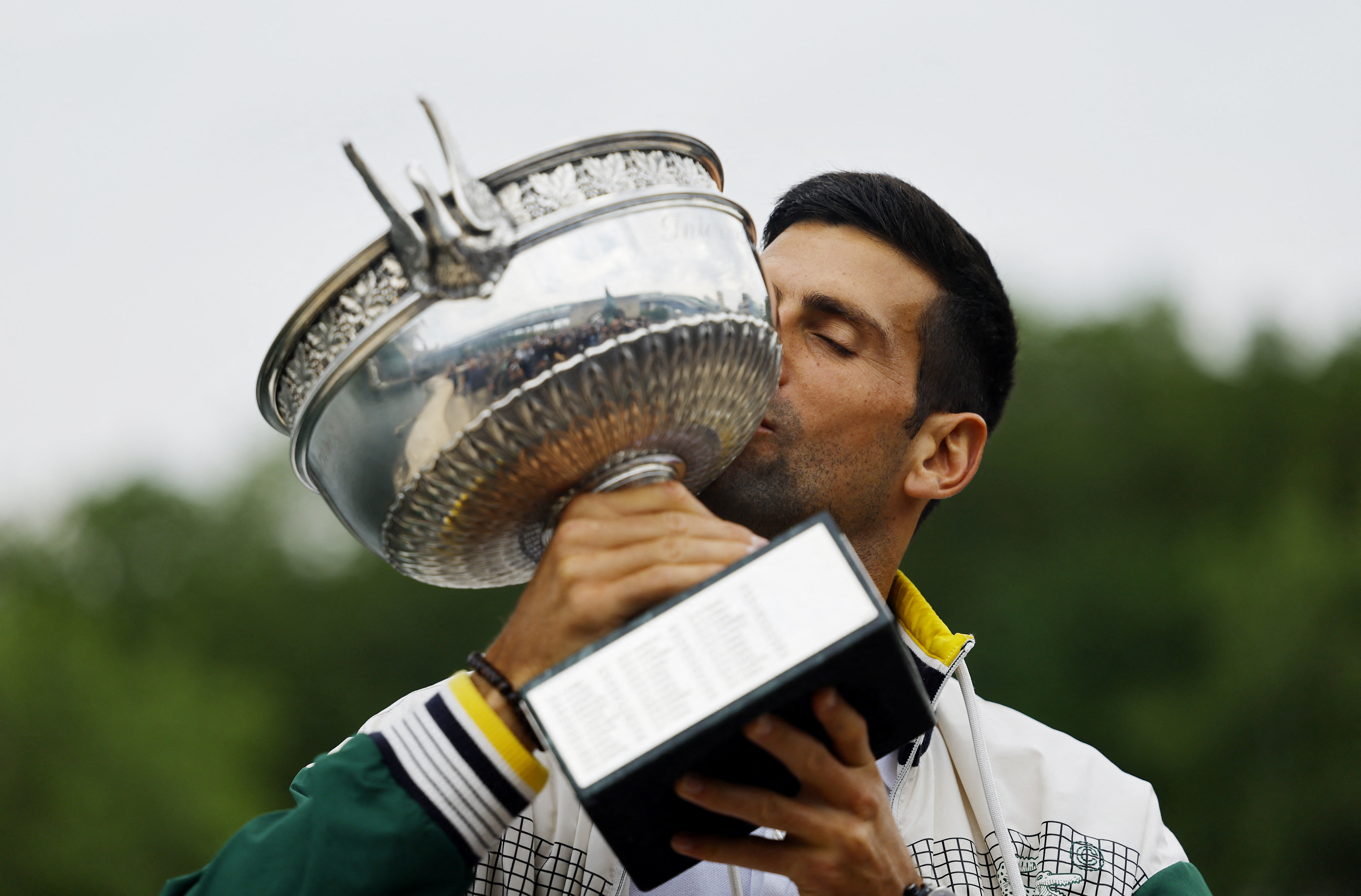 Djokovic kisses the French Open trophy