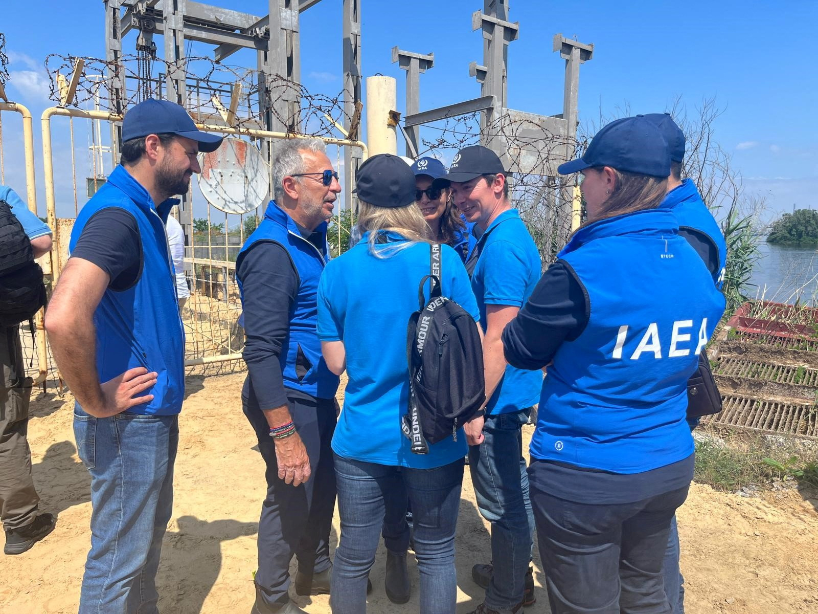 Members of an International Atomic Energy Agency expert mission inspect conditions at the Zaporizhzhia Nuclear Power Plant after a dam whose water is used to cool the facility’s reactors burst last week following an explosion