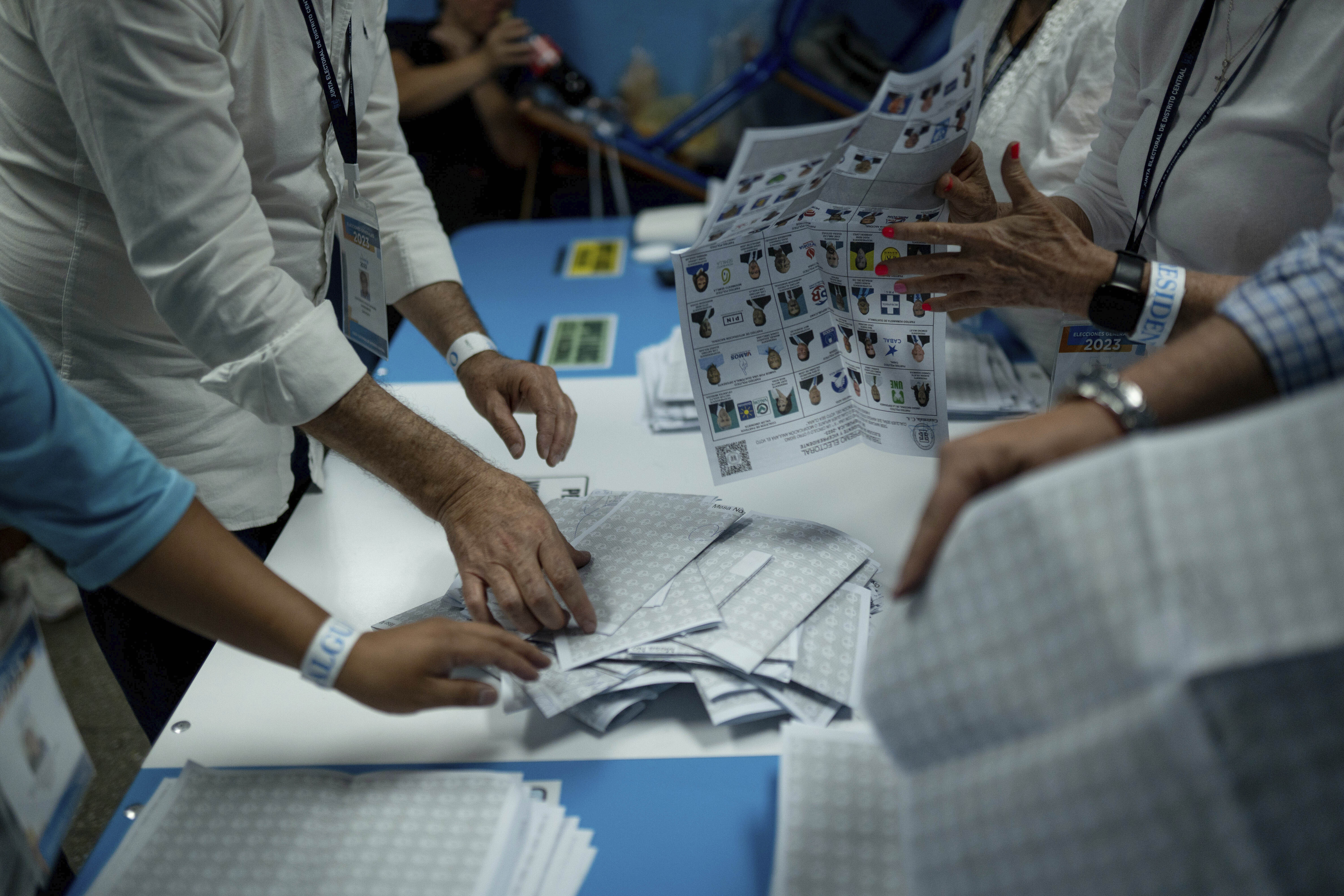 Electoral workers count ballots in Guatemala