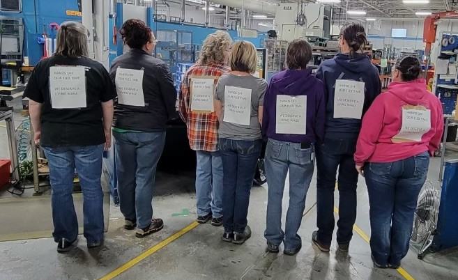 Women workers protesting at Brenda Scott's factory