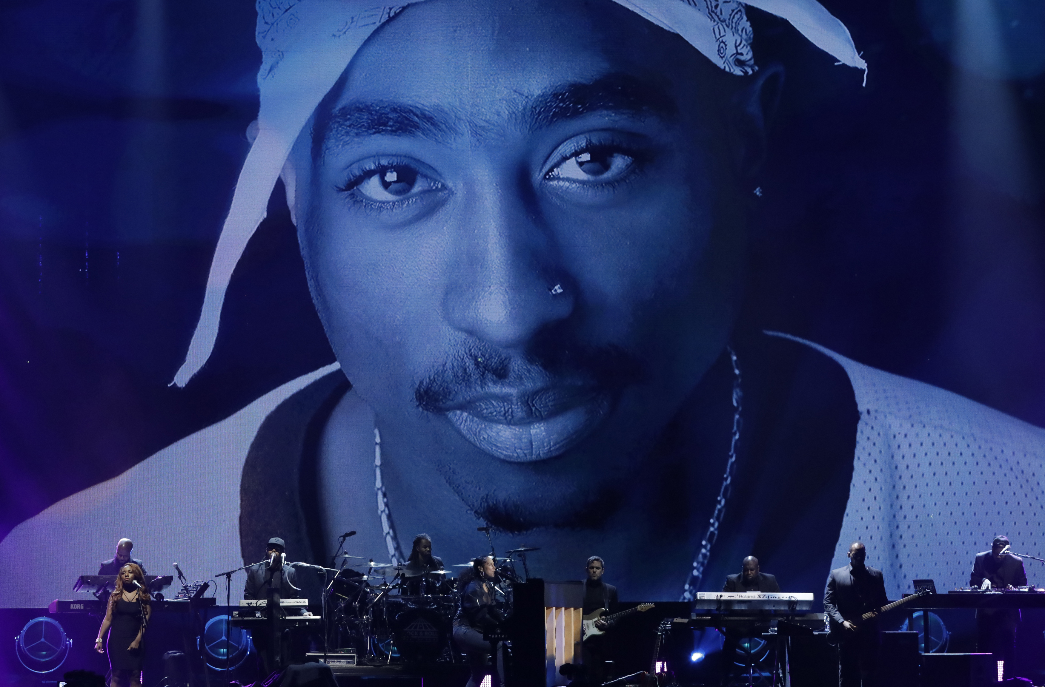 A photo of Tupac Shakur forms the backdrop for the 32nd Annual Rock & Roll Hall of Fame Induction Ceremony in 2017 in New York City, US, during which Alicia Keys performed in honour of the late rapper