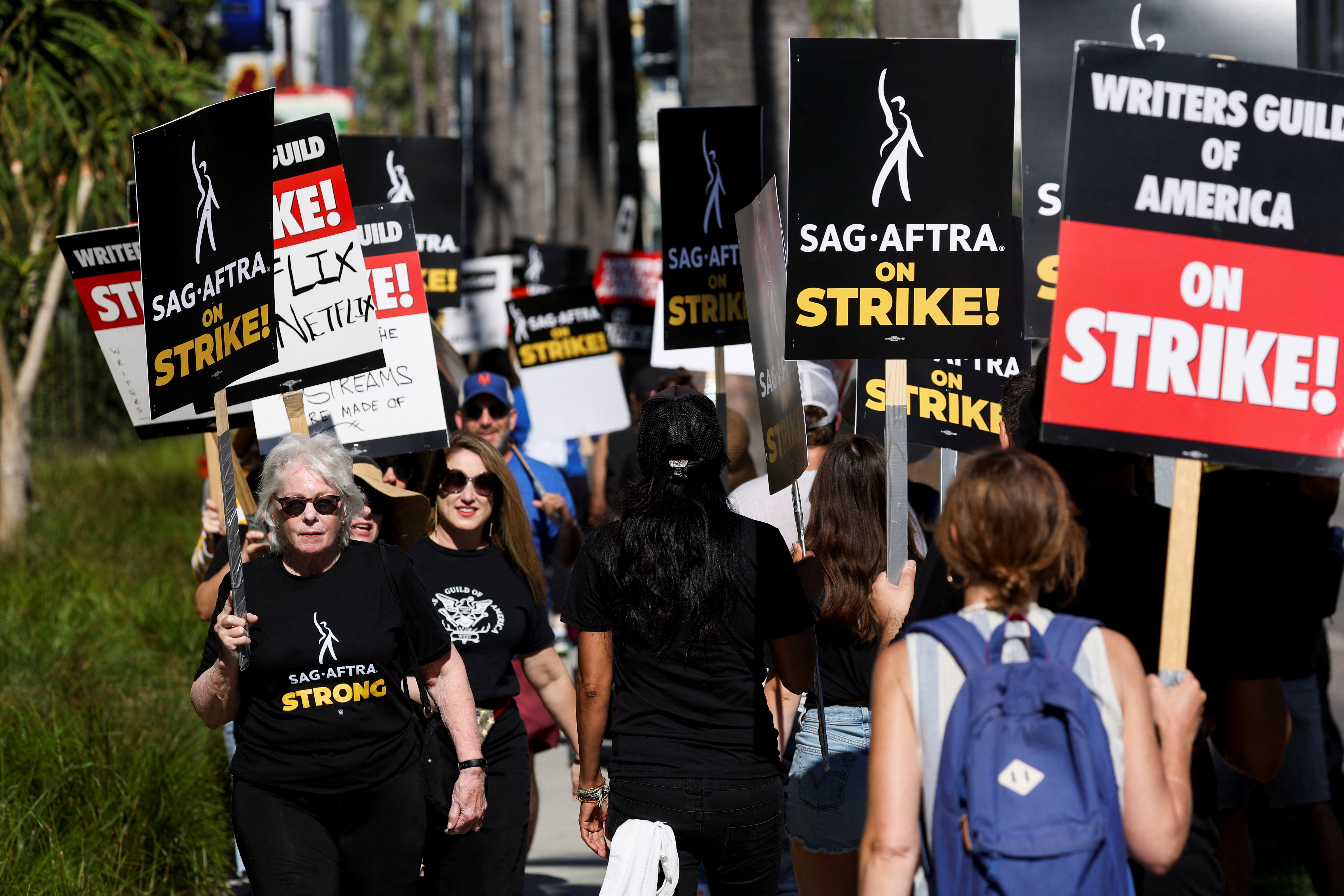SAG-AFTRA actors strike against the Hollywood studios as they join the Writers Guild of America (WGA) on the picket like outside of Netflix offices in Los Angeles, California, US