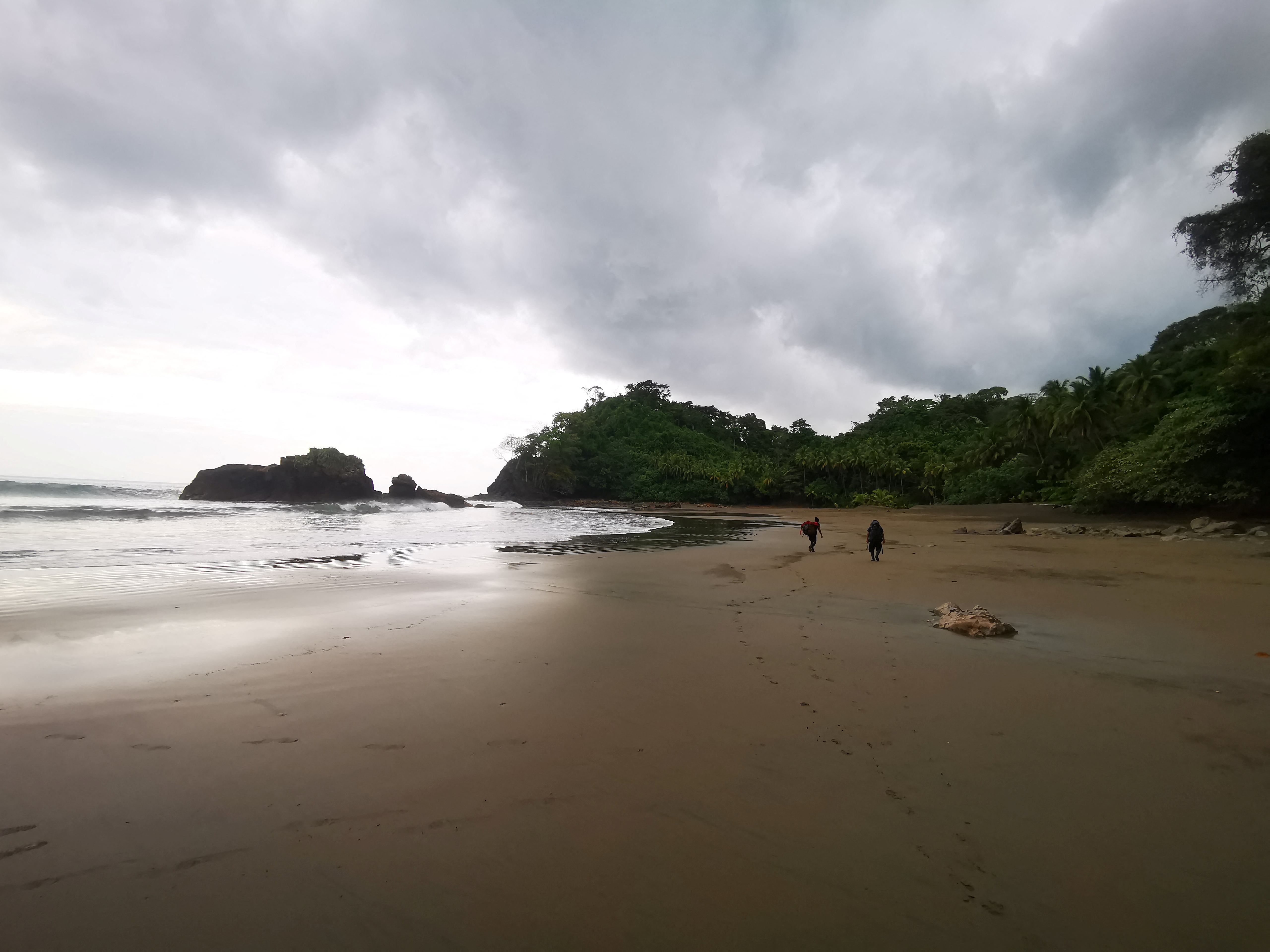 Tourists hike during an excursion through the Darien Gap