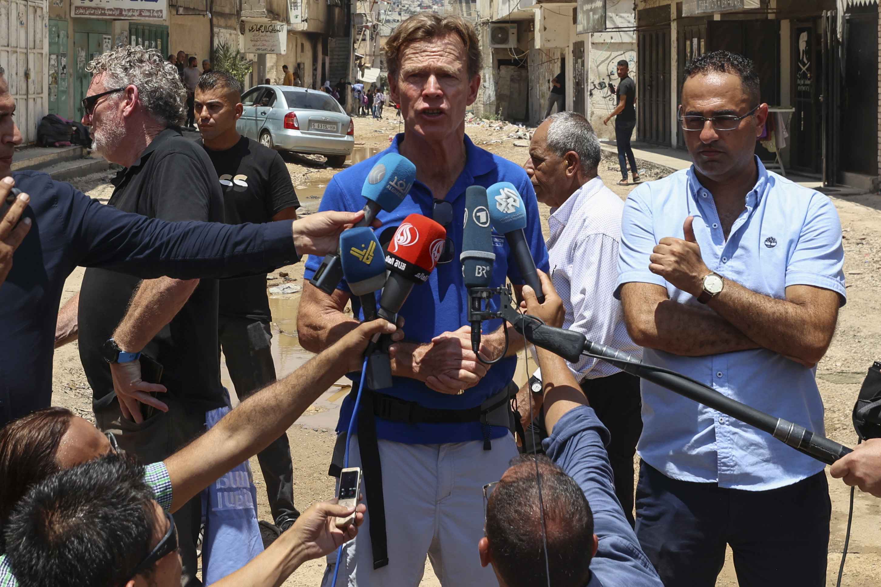 European Union representative to the Palestinian territories Sven Kuehn von Burgsdorff speaks to reporters in Jenin refugee camp