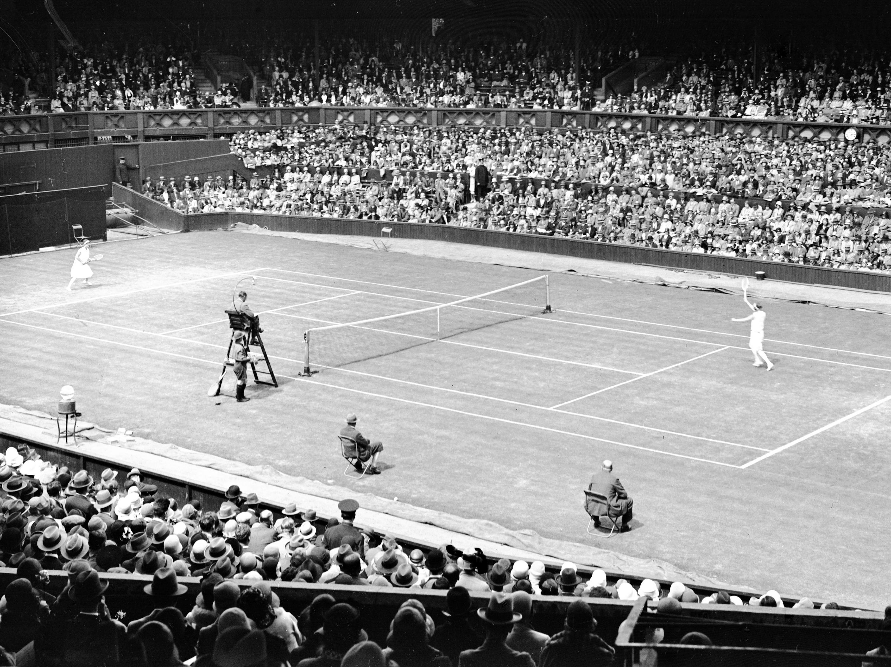 The match between American champion Helen Wills and Britain's Elsie Godlsack, in their third round match at Wimbledon, on June 27, 1928. 