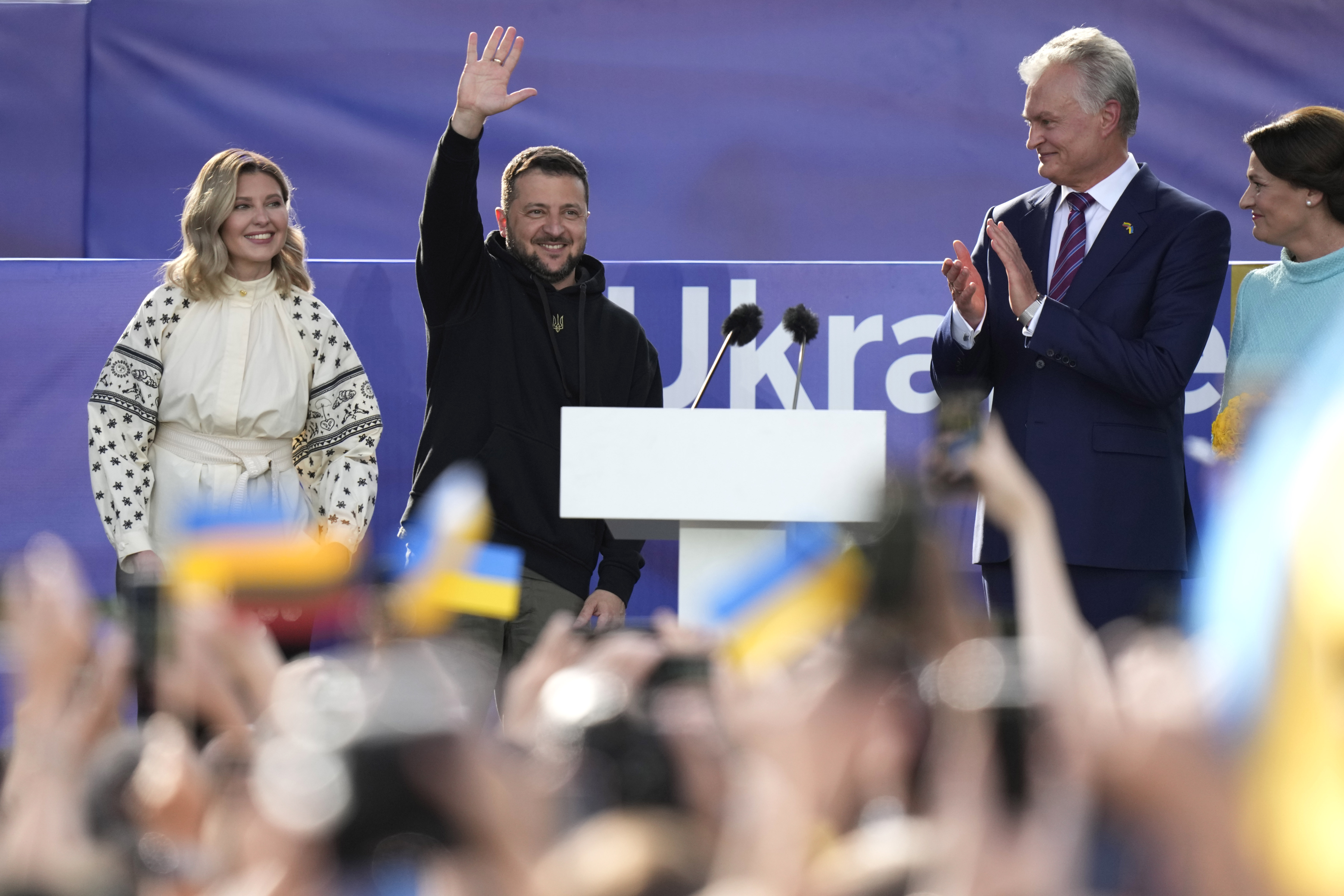 Ukrainina President Volodymyr Zelenskyy waving during an appearance in Vilnius