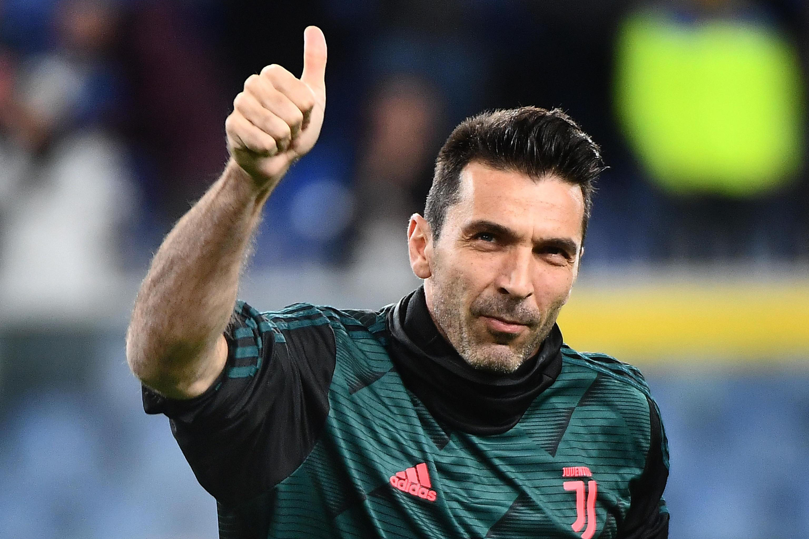 Juventus' goalkeeper Gianluigi Buffon cheers supporters
