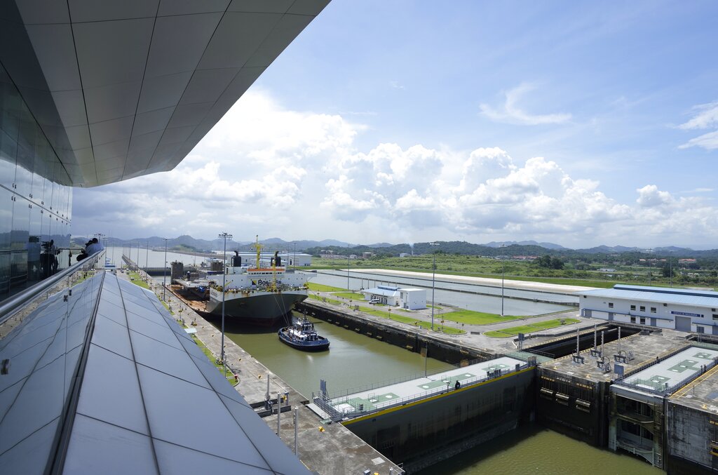 A ship sails thru a lock