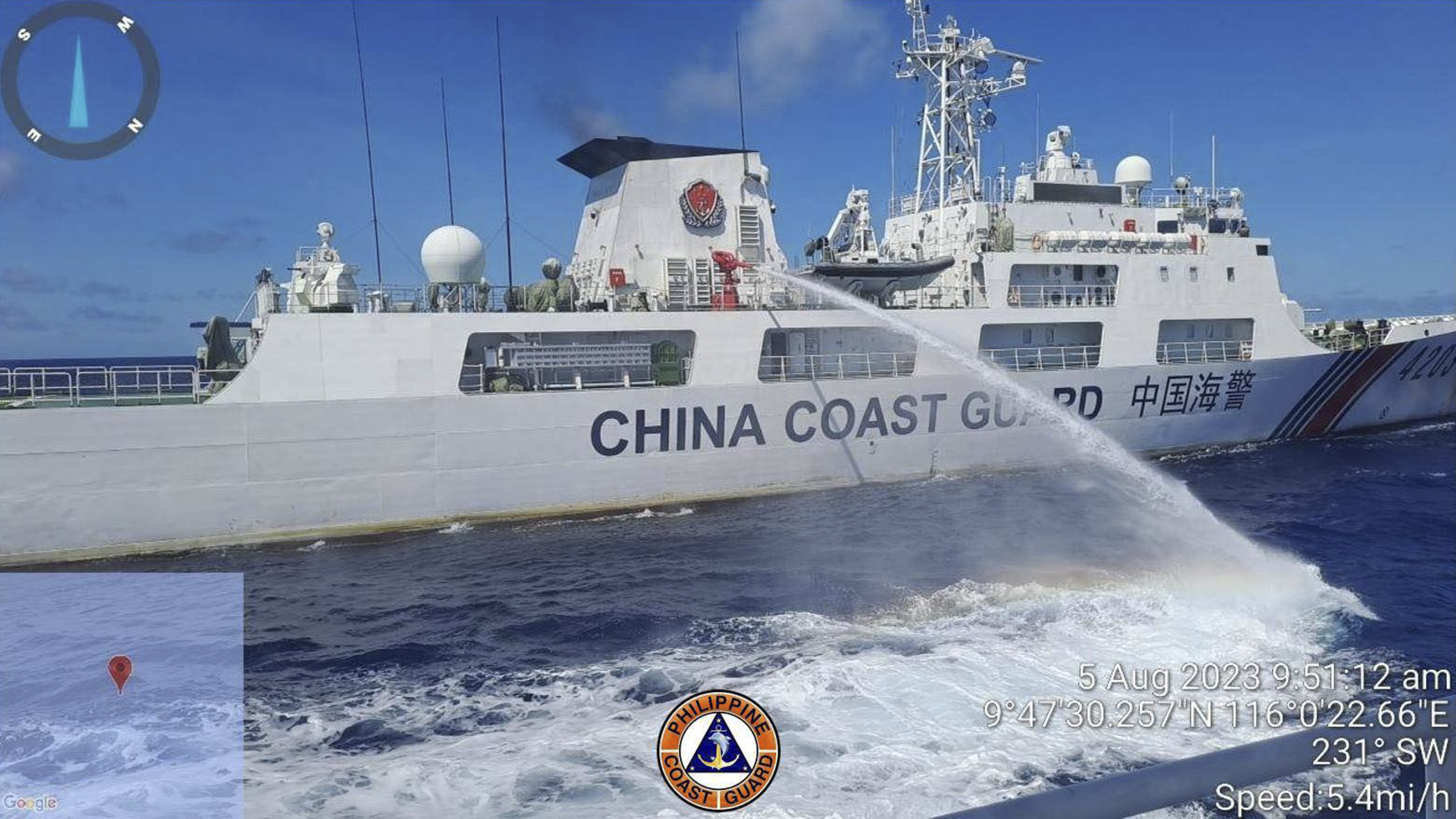 In this handout photo provided by the Philippine Coast Guard, a Chinese coast guard ship uses a water cannon on a Philippine Coast Guard ship
