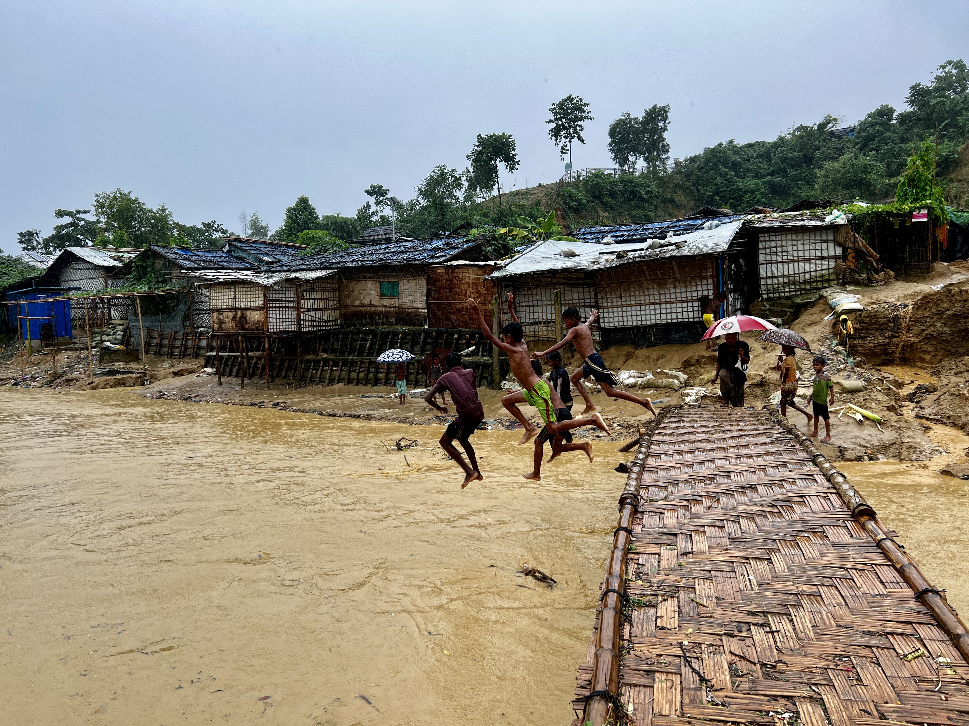 Cox's Bazar, children jump into water