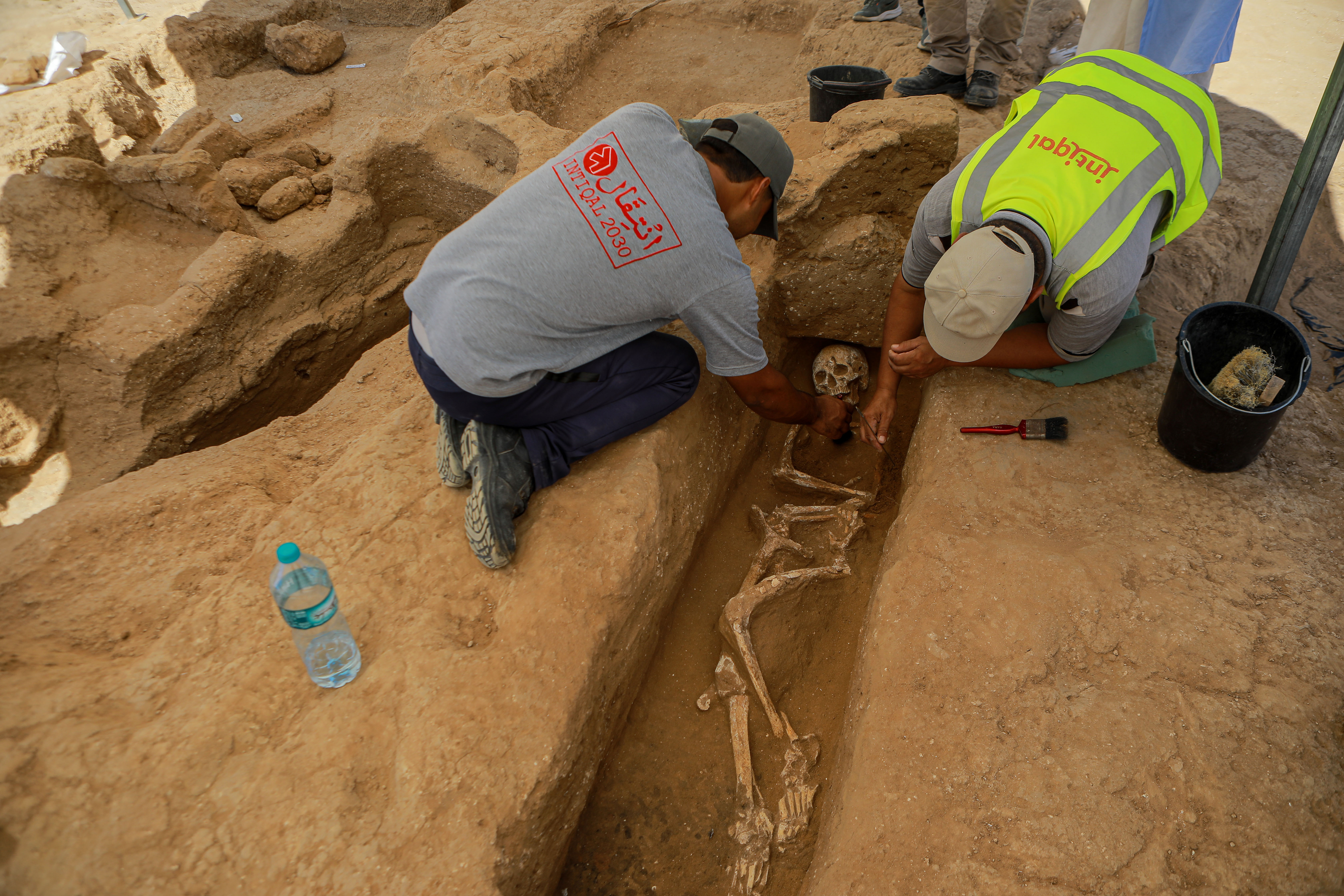 Two men work in excavations