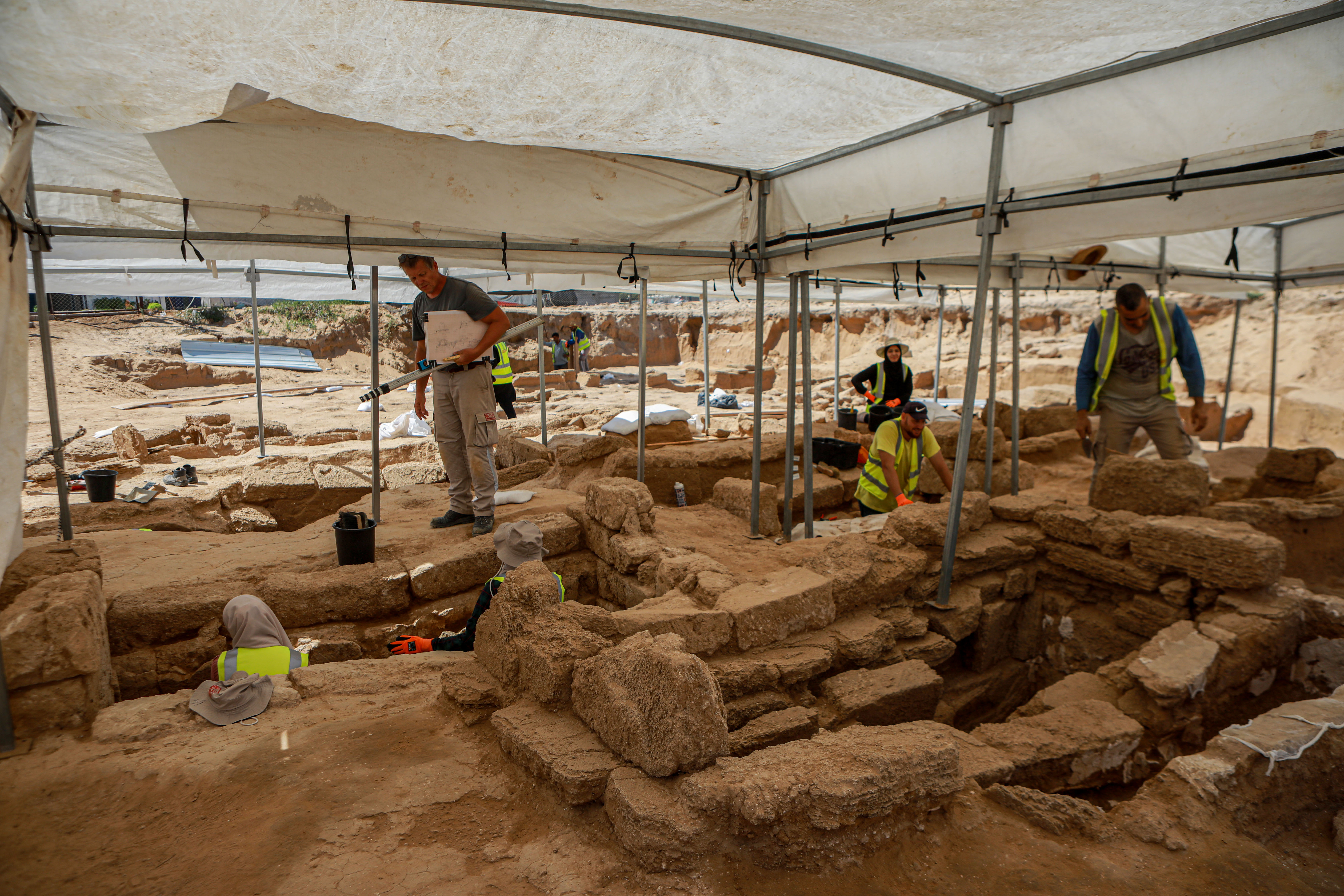 Technicians work in a roman cemetery