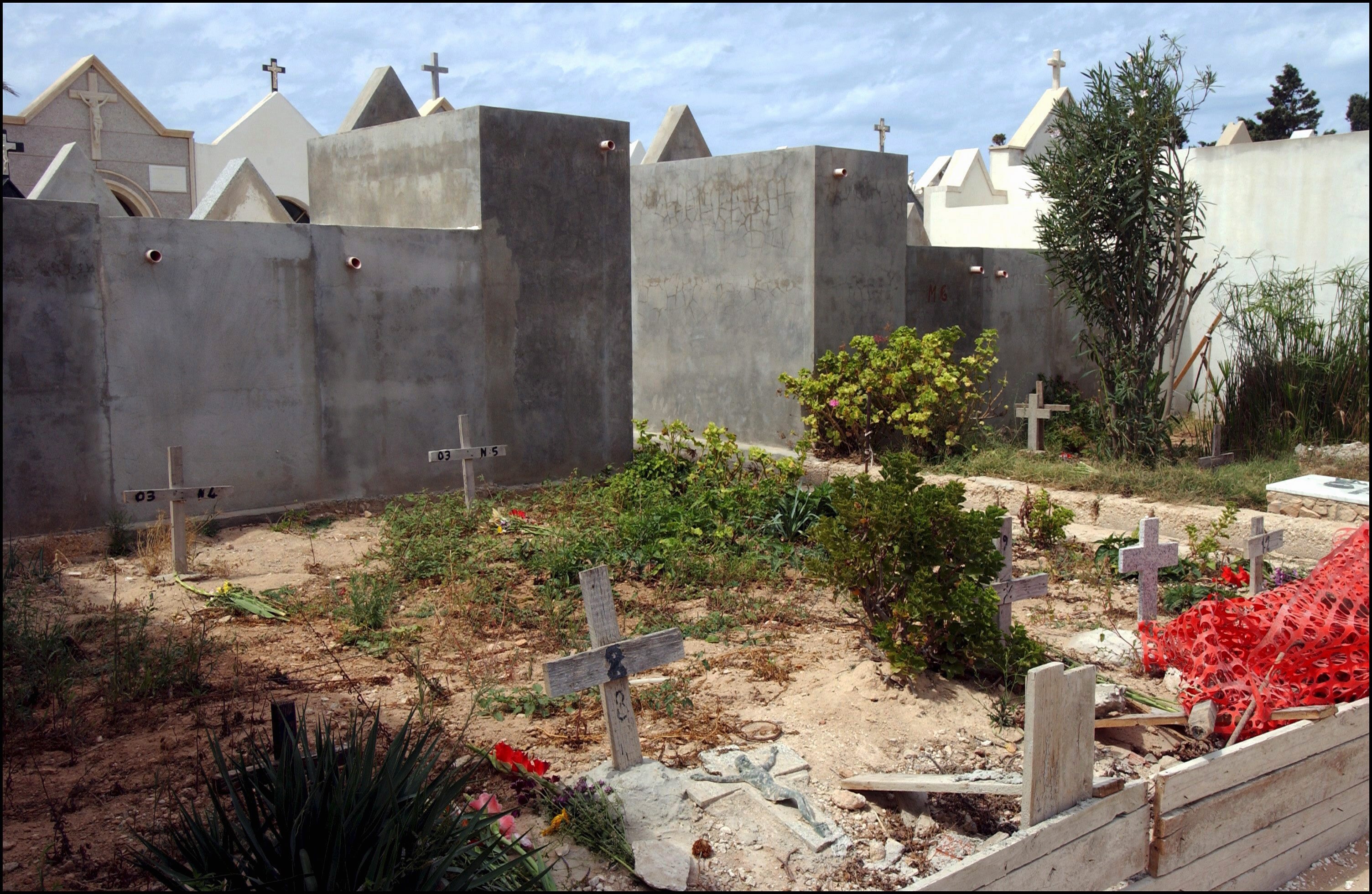 The graveyard for unnamed refugees who died at sea, pictured in 2004, three years before Vincenzo retired as the graveyard keeper